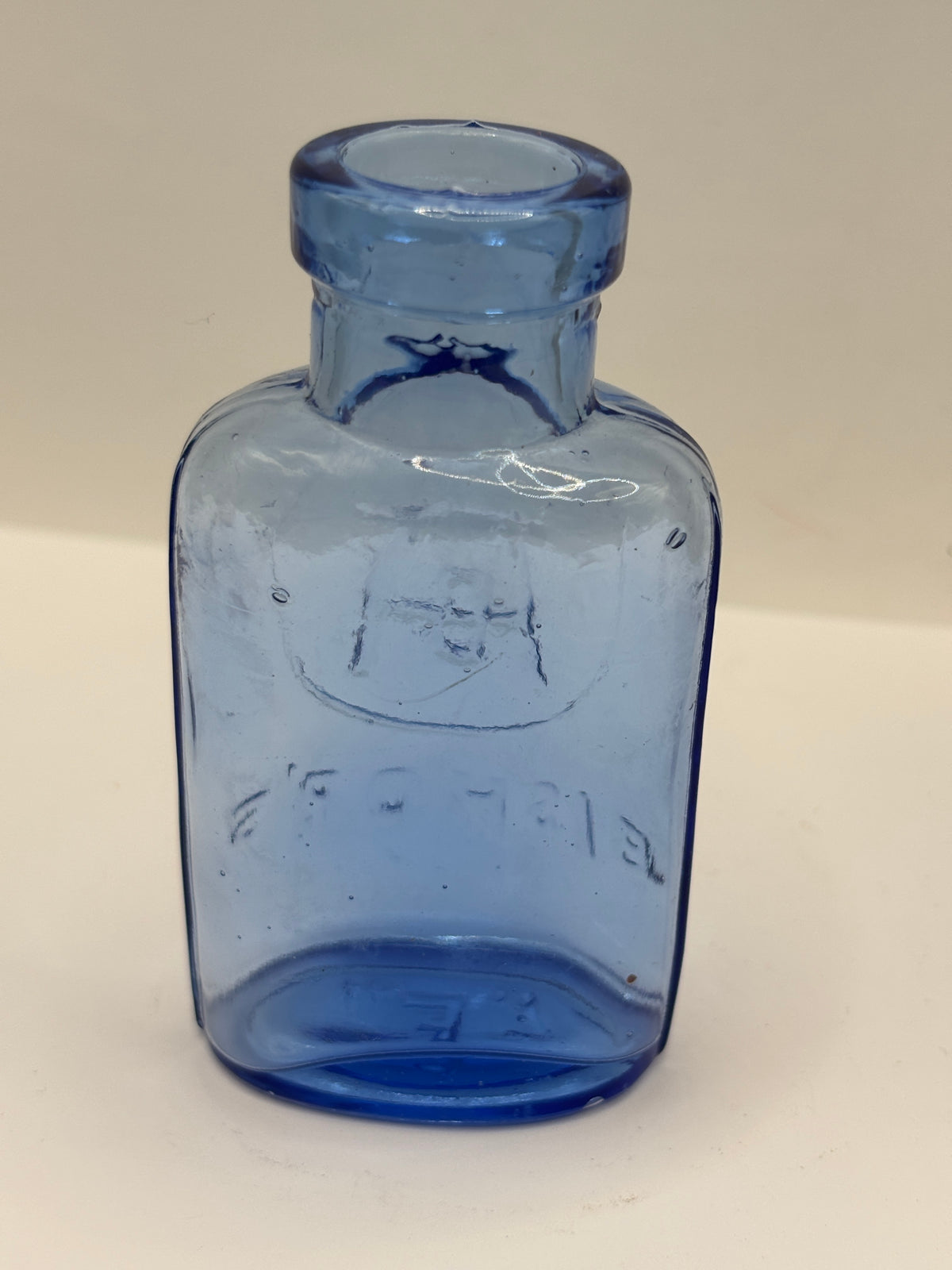 old small blue bishops chemist bottle