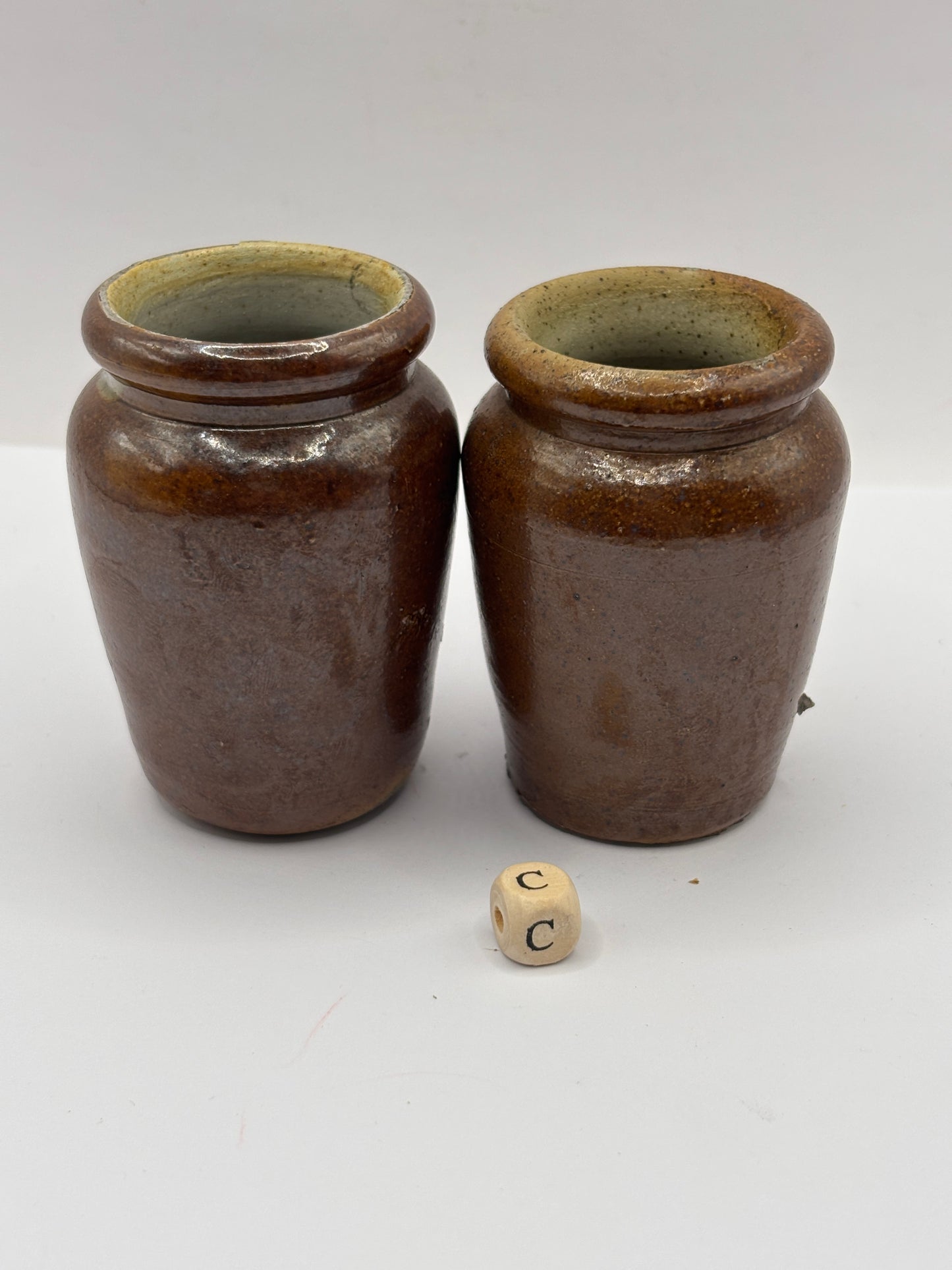 2 old small brown stoneware cream pots (c)