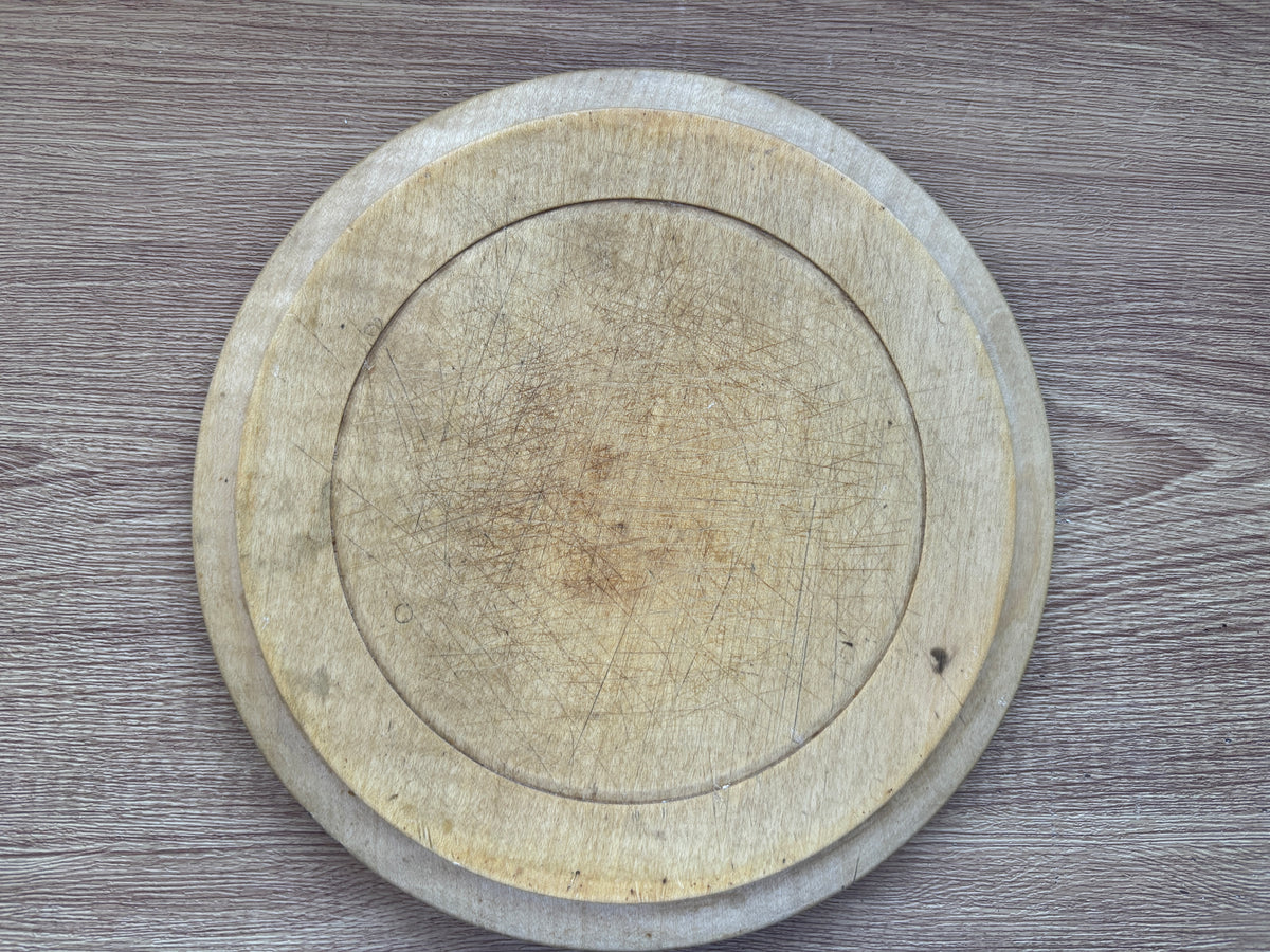 Old wooden carved bread board
