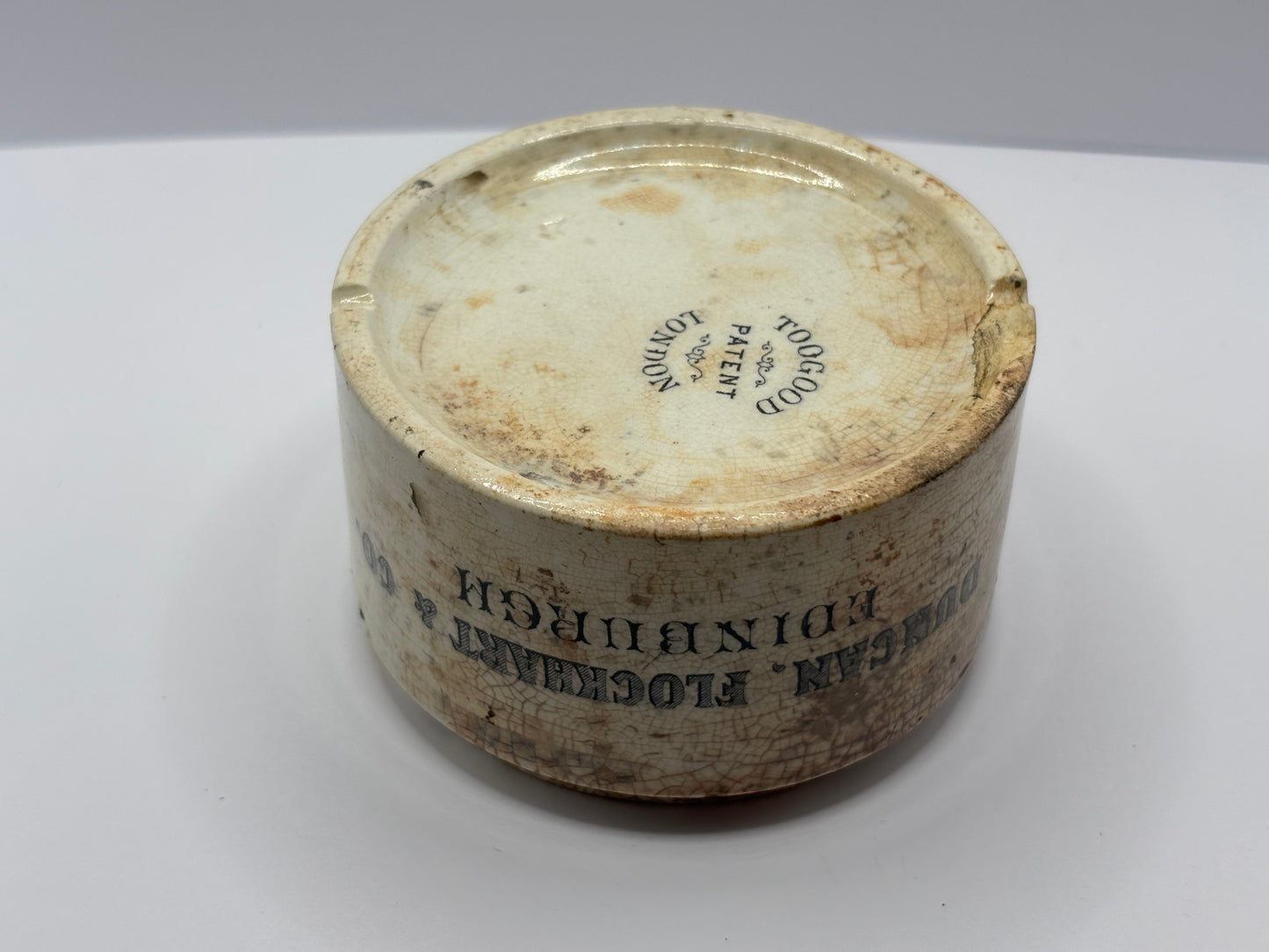 Old large Duncan Flockhart advertising chemist base, stained & crazed