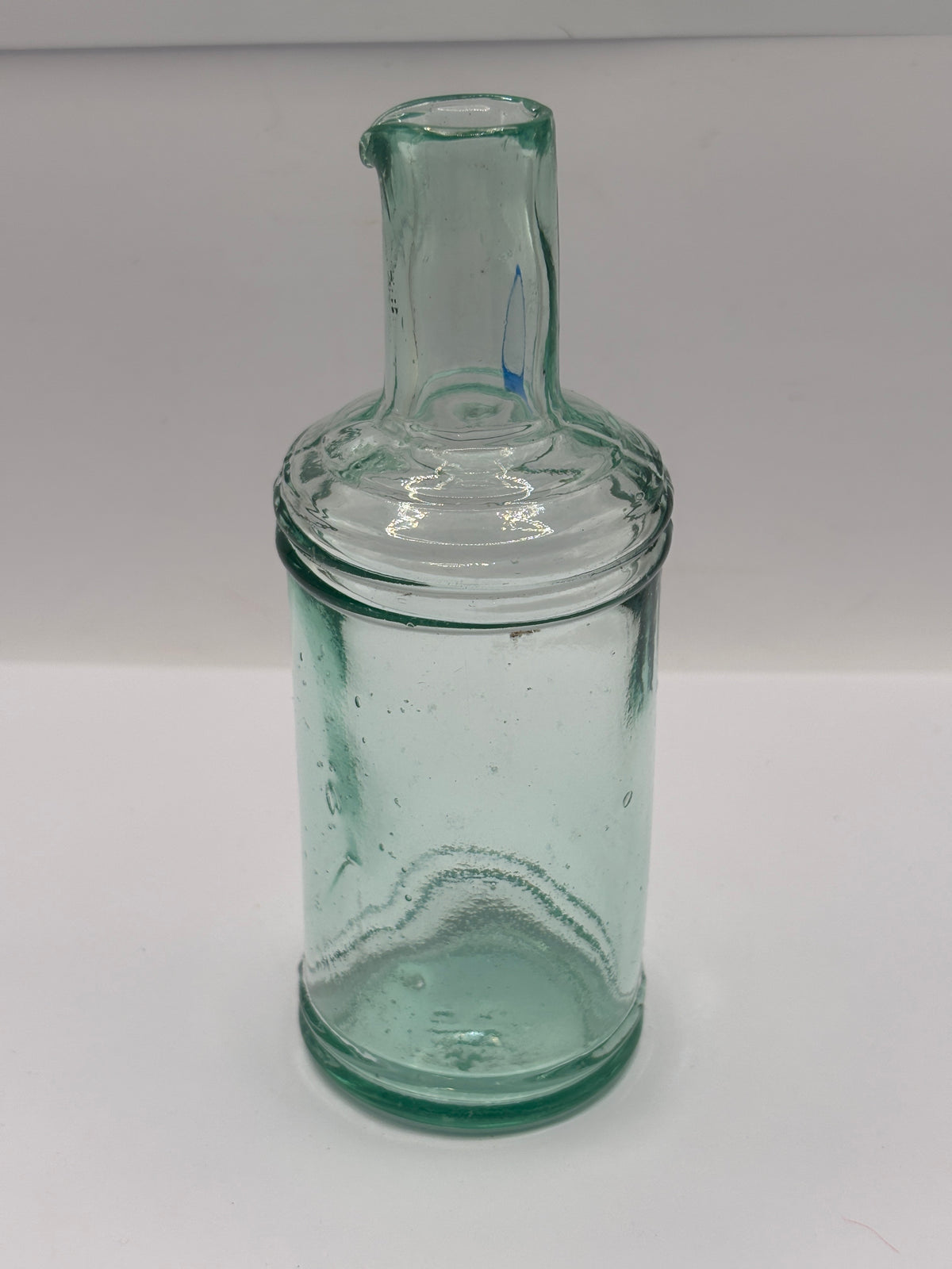 Old tall aqua glass inkwell, ink bottle, pouring ink 14.5cms