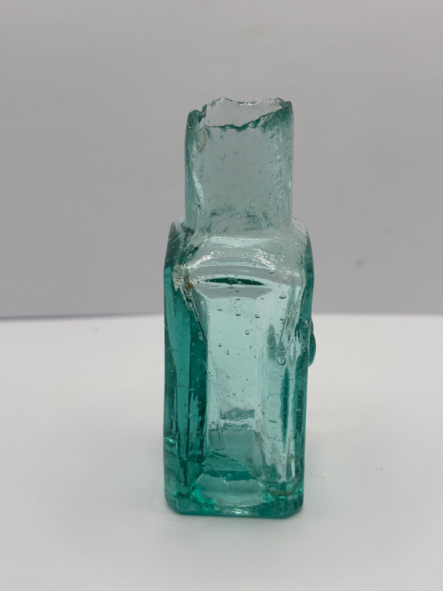 Old aqua glass advertising ink, ink bottle, inkwell. Lion brand ink