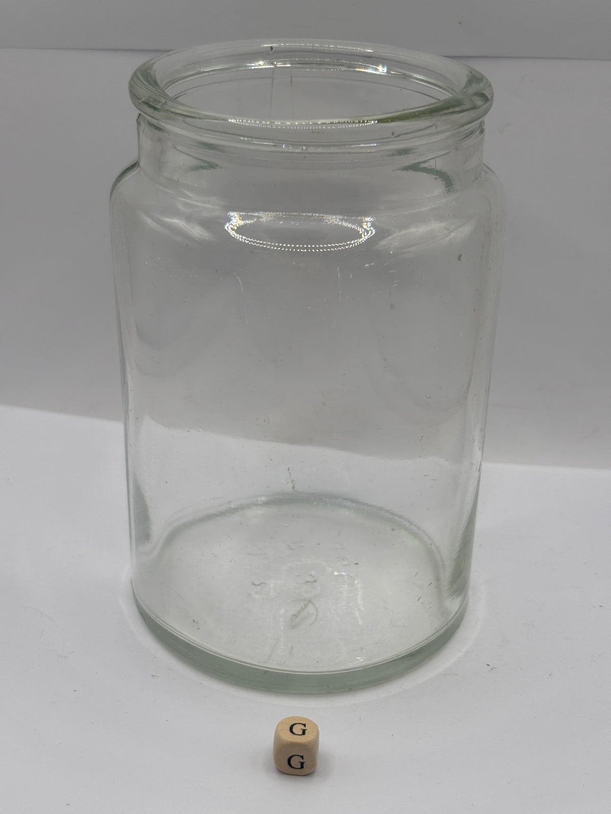 Old clear glass pickle jar (G)