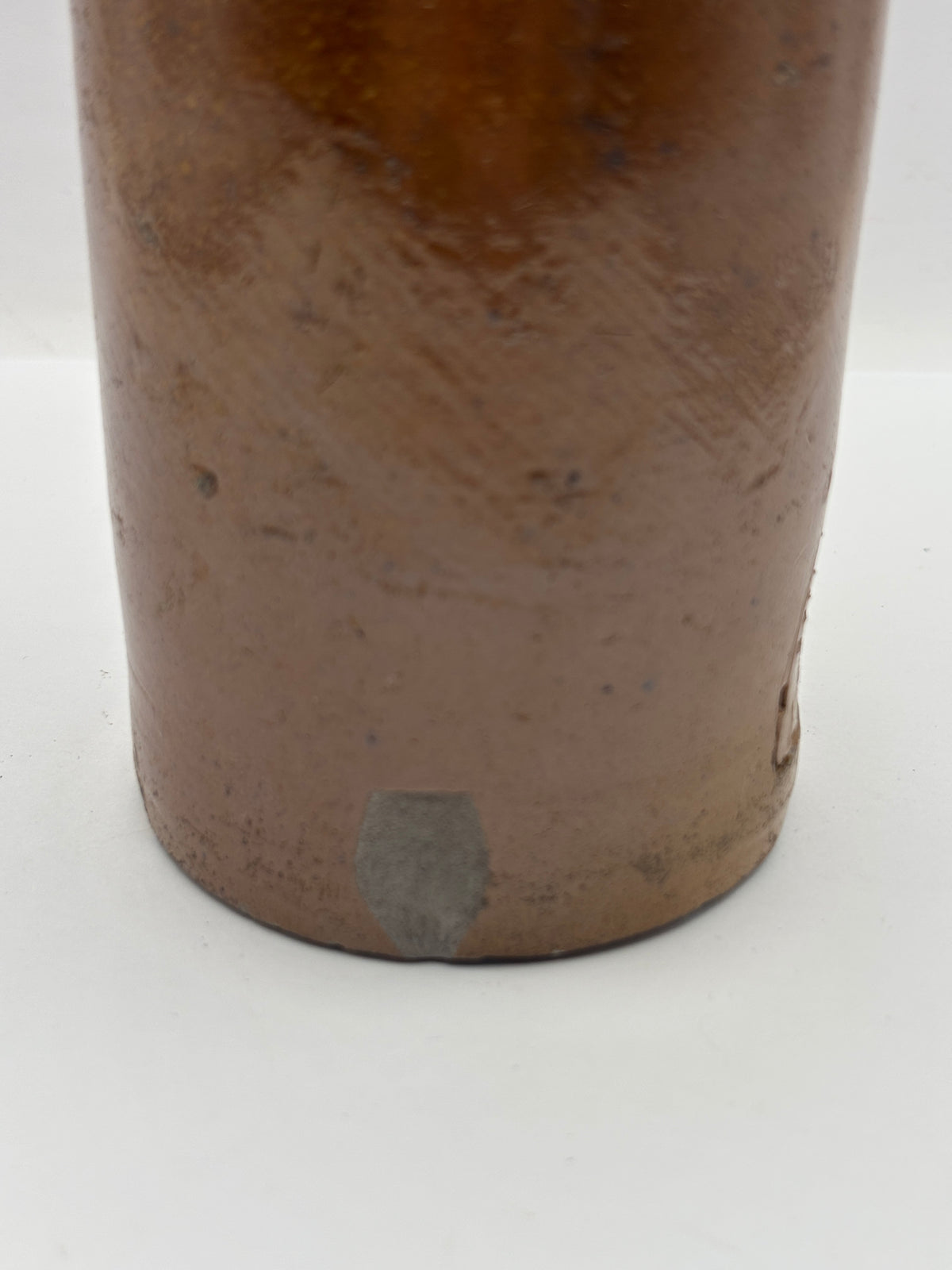 Old impressed stoneware ginger beer bottle, London. Hills chapman & co