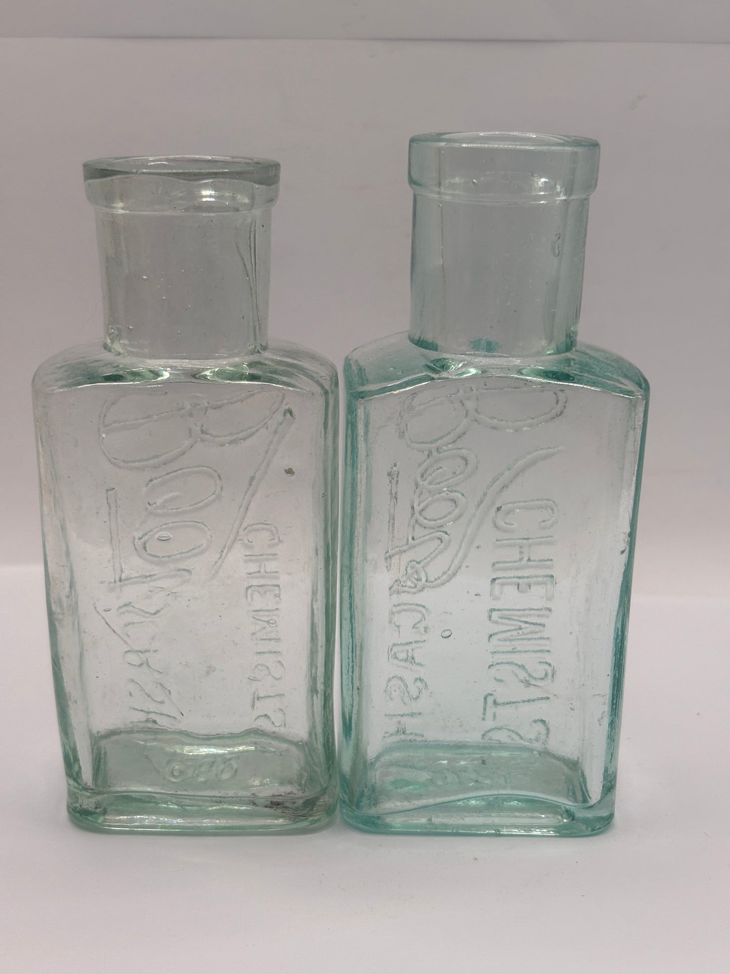 2 Old glass Boots cash chemists bottles