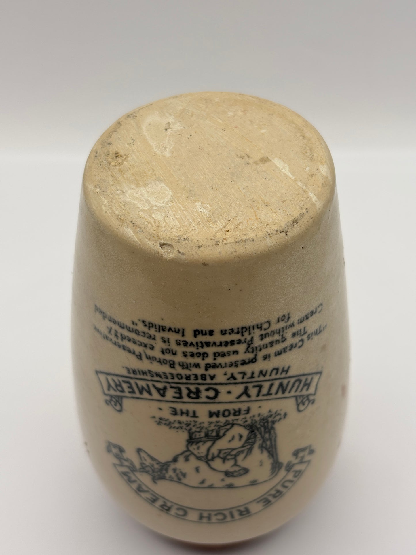 Old advertising cream pot, Huntly creamery. Milk maid. Pure rich cream