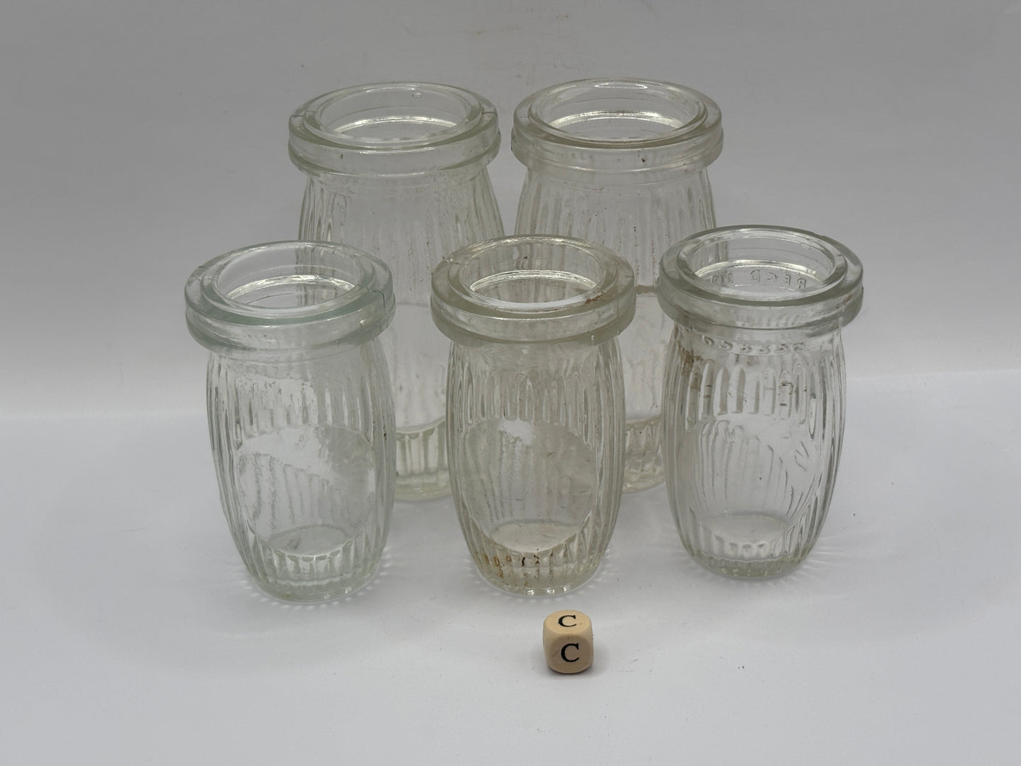 5 old clear glass meat paste jars (c)