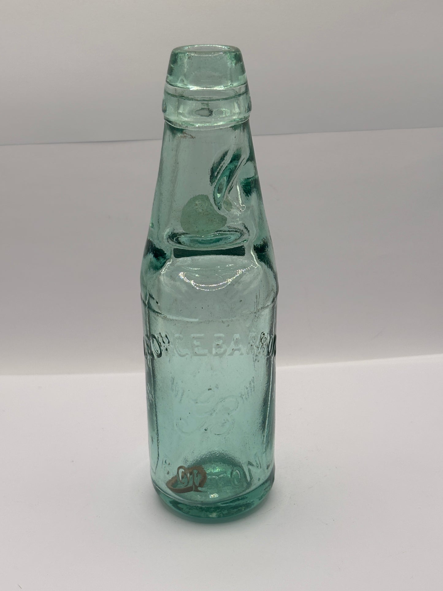 Old Bolton codd bottle, with marble. Victoria bottling stores