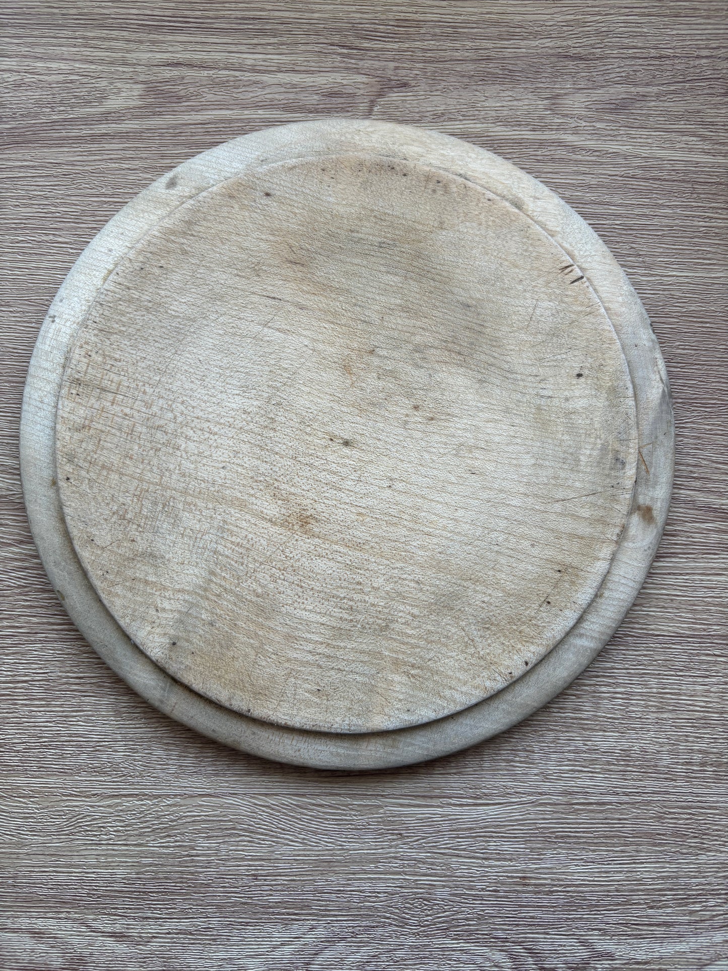 Old wooden carved bread board
