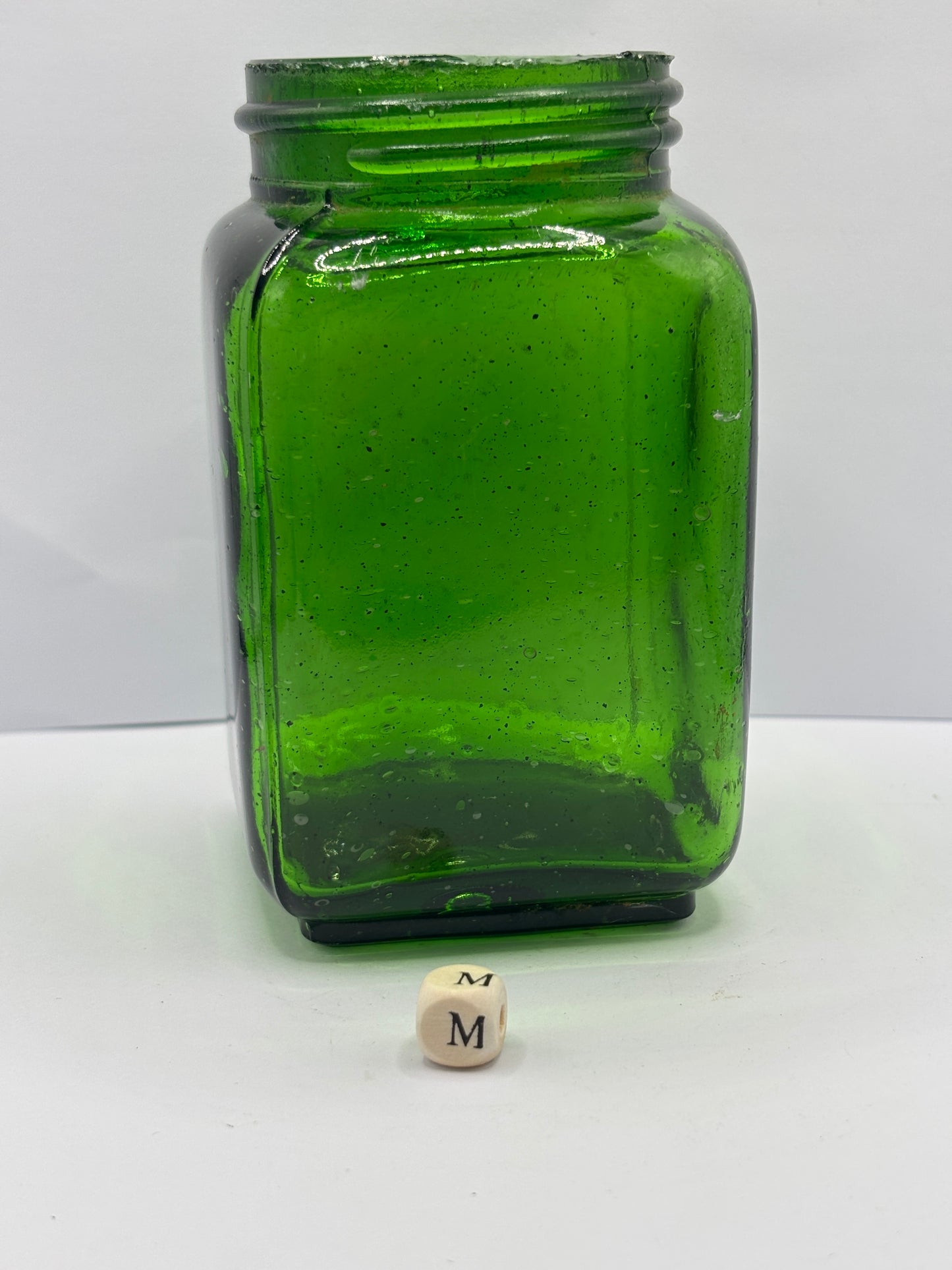 Old green glass pickle jar (m)