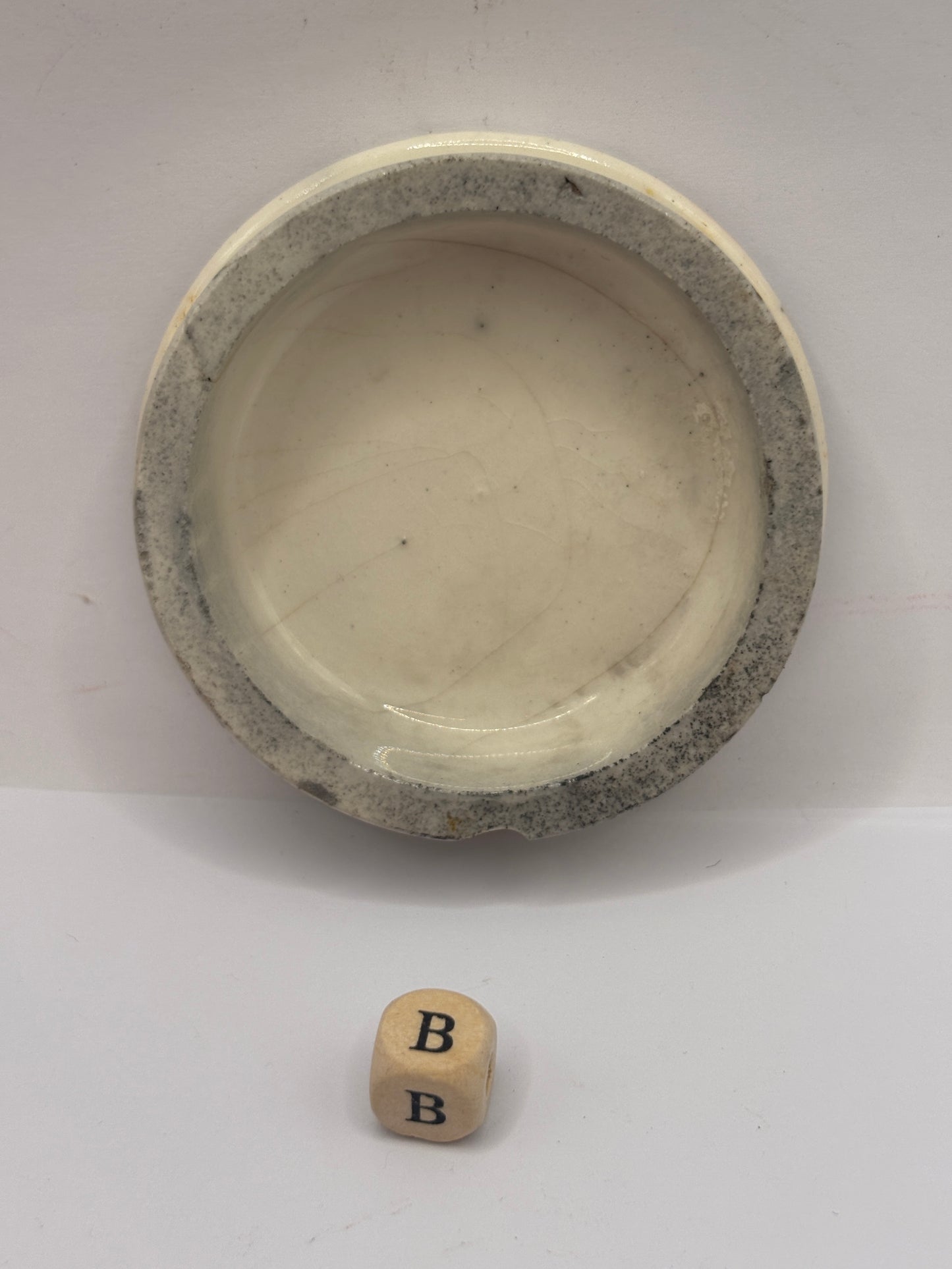 Old advertising lid, Woods areca nut tooth paste (B)