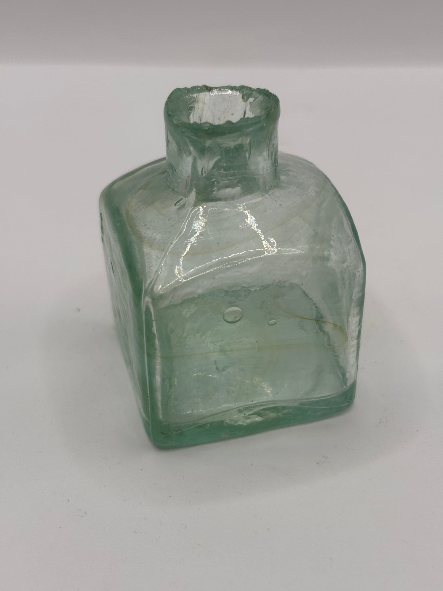 Old aqua glass advertising inkwell, ink bottle. Pridge ink