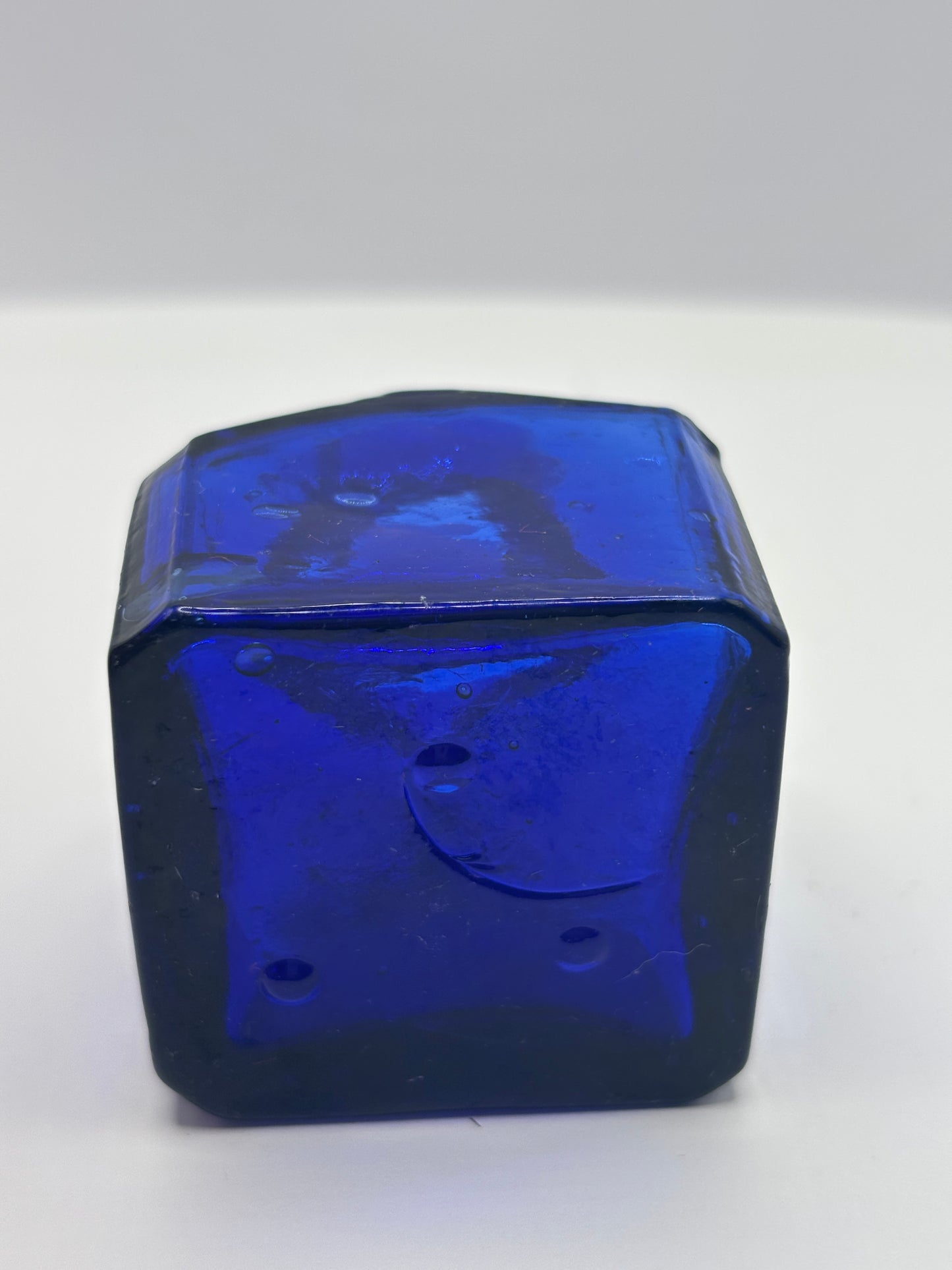Old cobalt blue glass inkwell, ink bottle