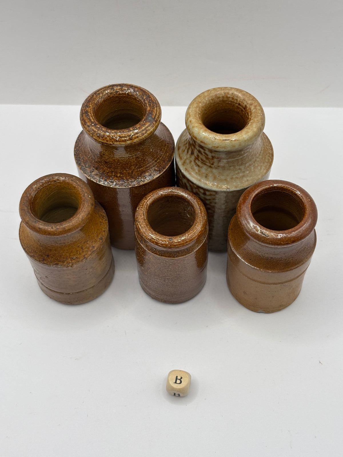 5 small brown stoneware pots (B)