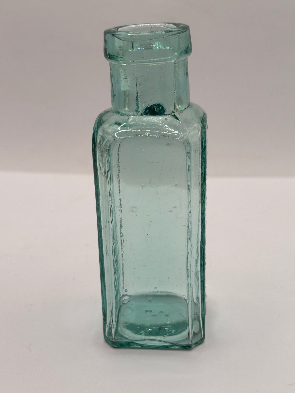 Old aqua glass advertising bottle, Eiffel tower Lemonade