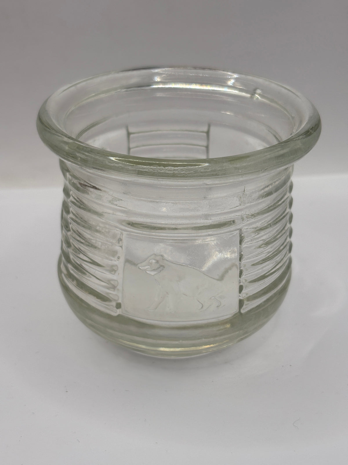 Old clear glass honey pot, bears