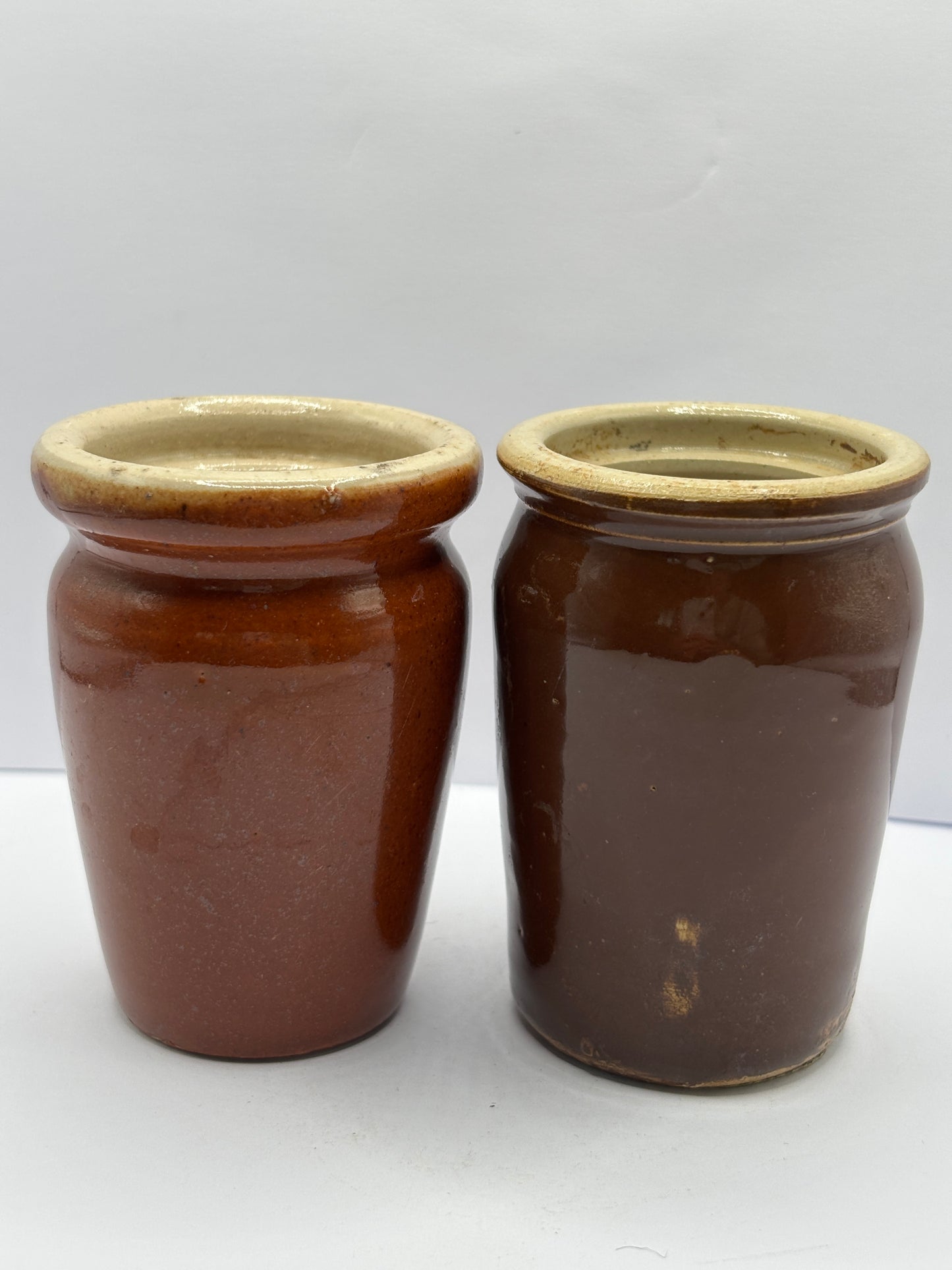 2 old brown stoneware cream pots