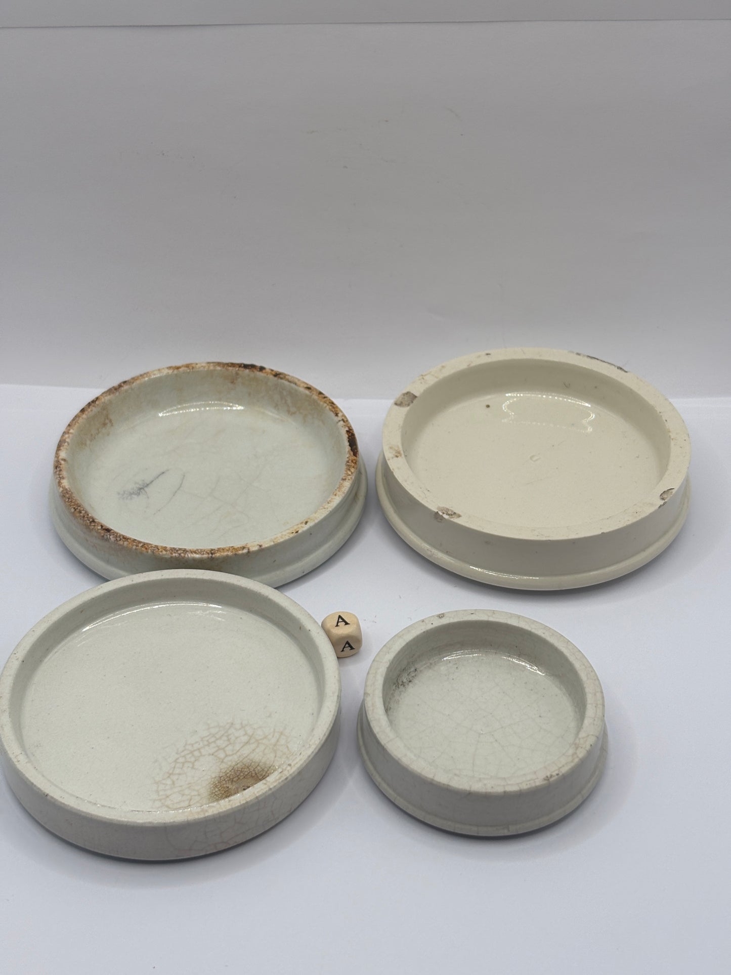 4 old plain stoneware lids, stacking lids (A)
