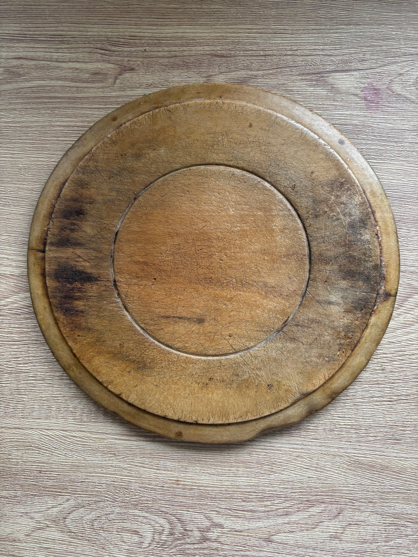 Old wooden carved bread board