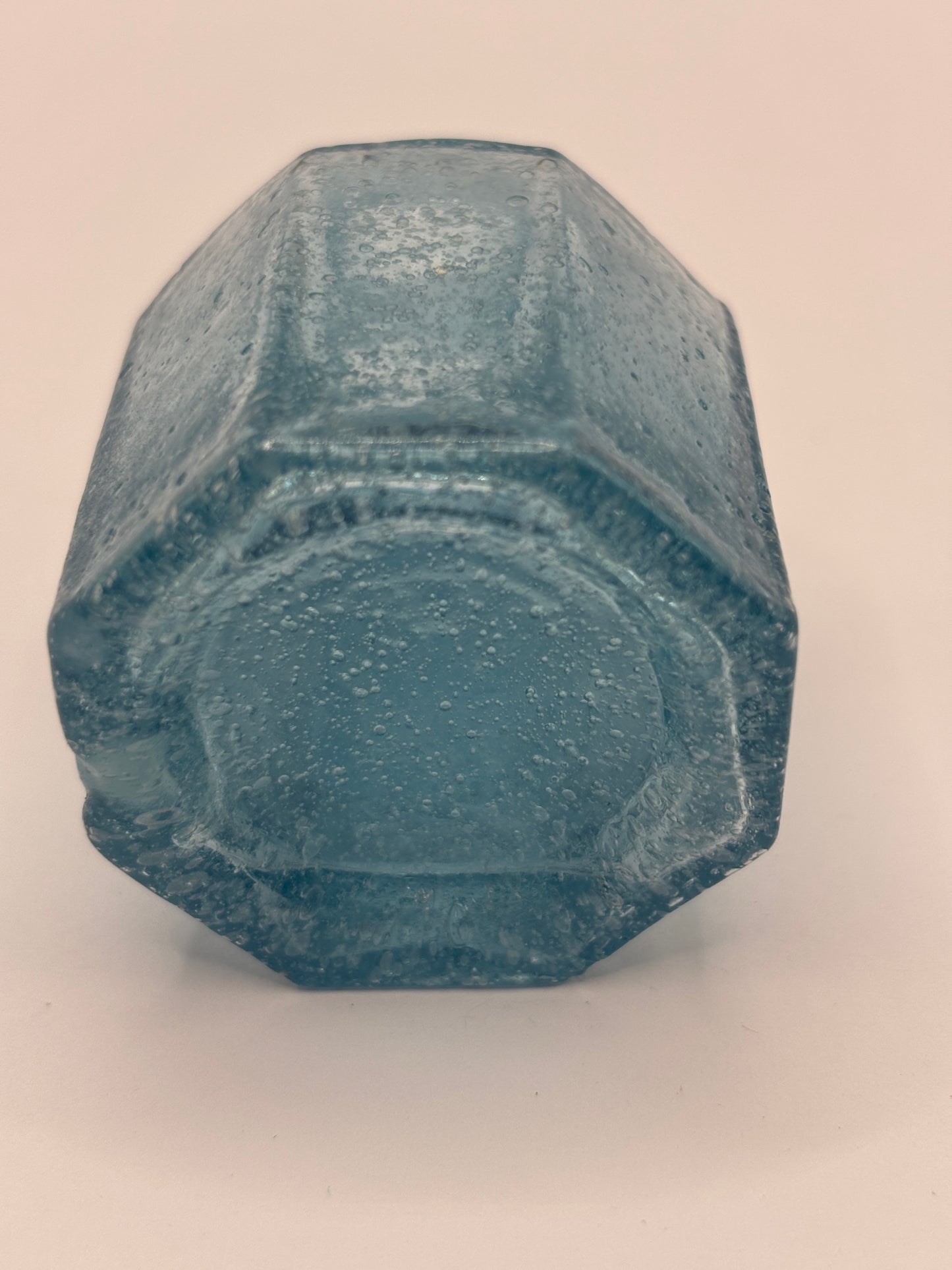 Old blue glass inkwell, ink bottle, penny ink. Lots of air bubbles