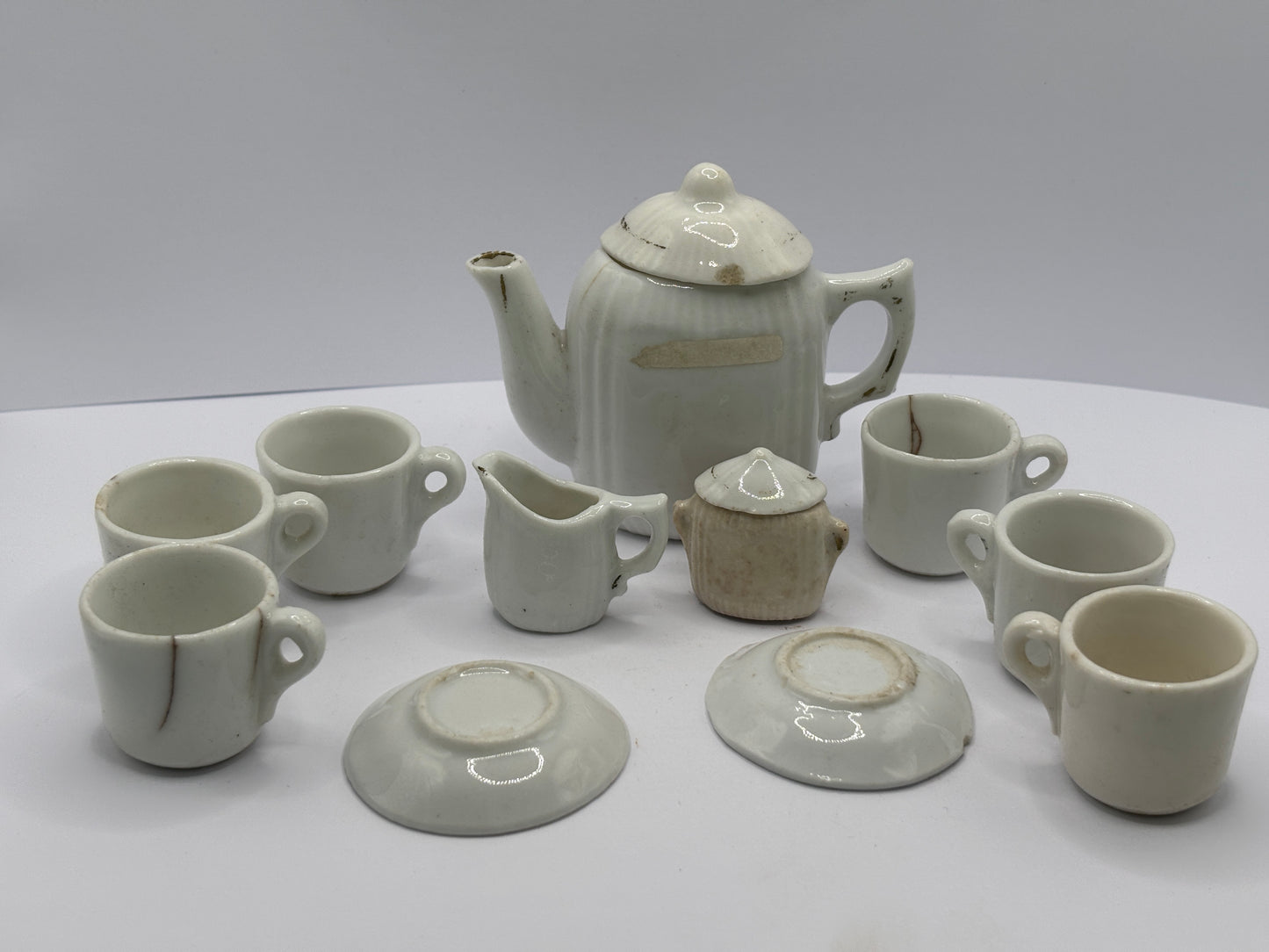 11 piece mini dolls house tea set, damages