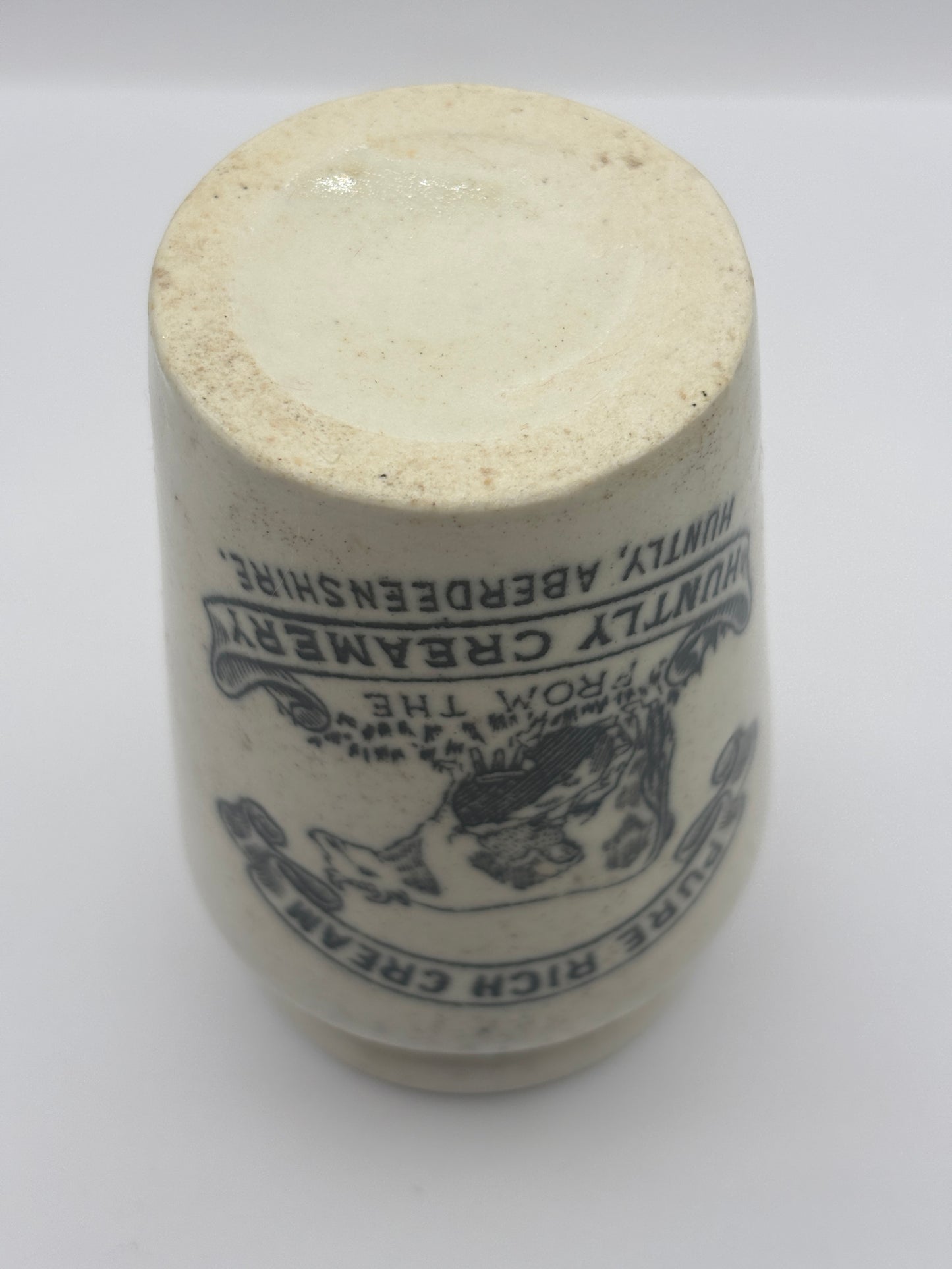 Old advertising cream pot, Huntly creamery. Milk maid. Pure rich cream