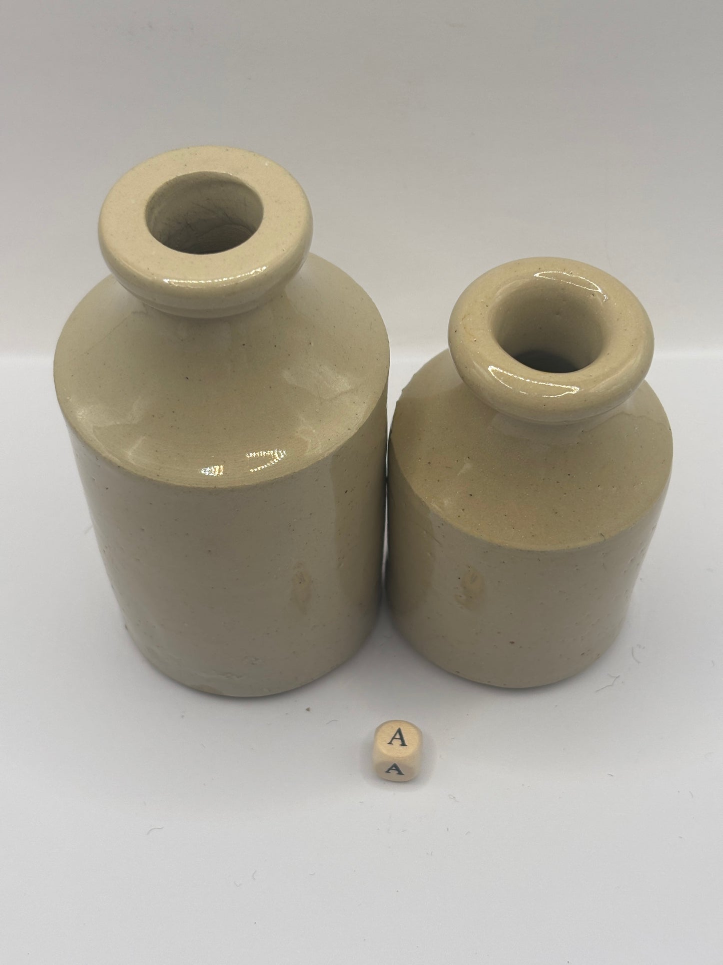 2 old off white stoneware furniture cream pots, bottles (a)
