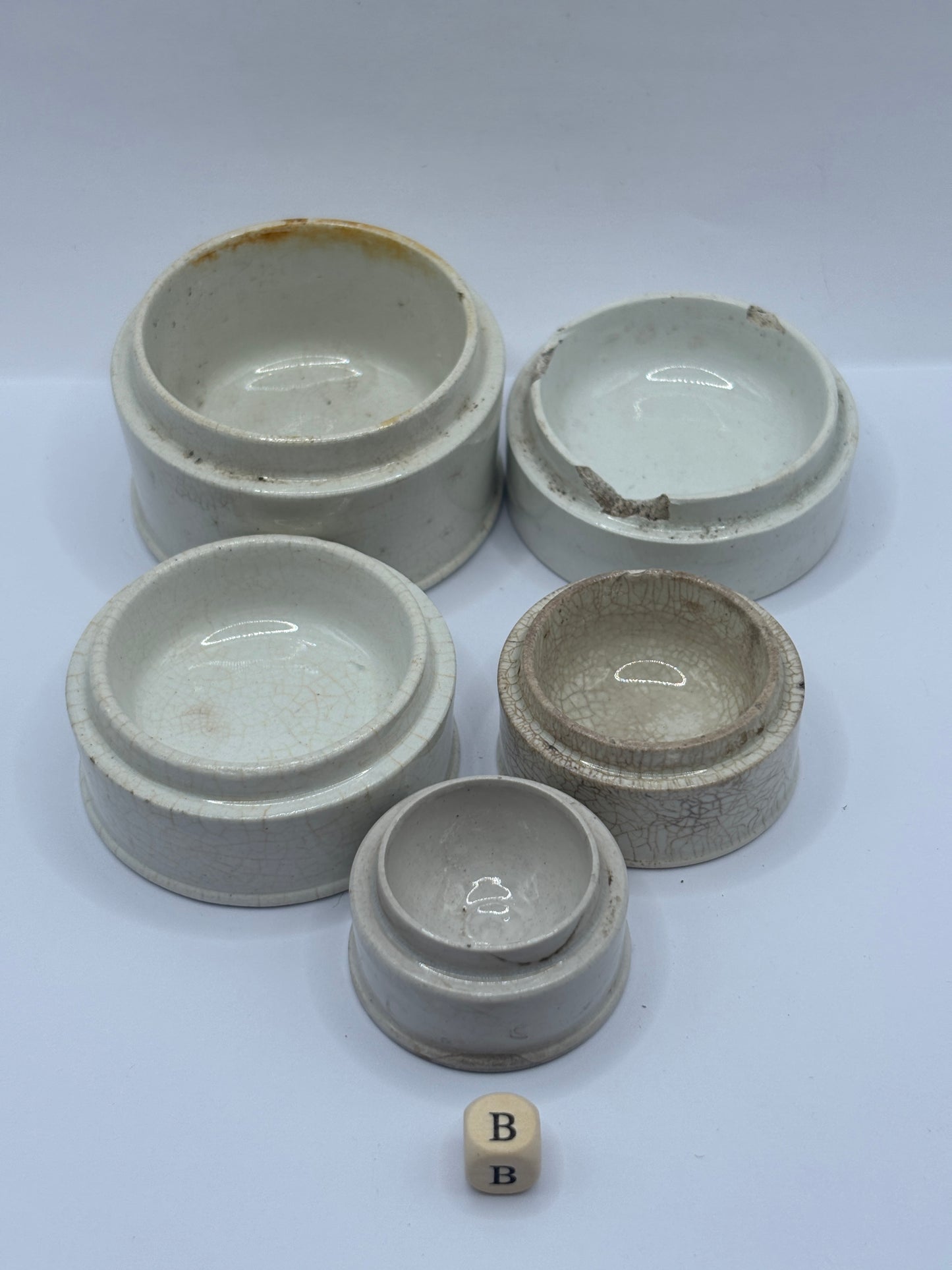 5 old pot lid bases, stackers, risers (B)