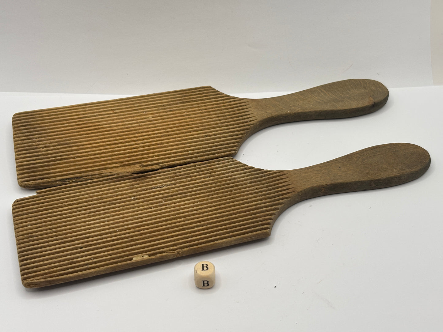 Old wooden butter pats (B)