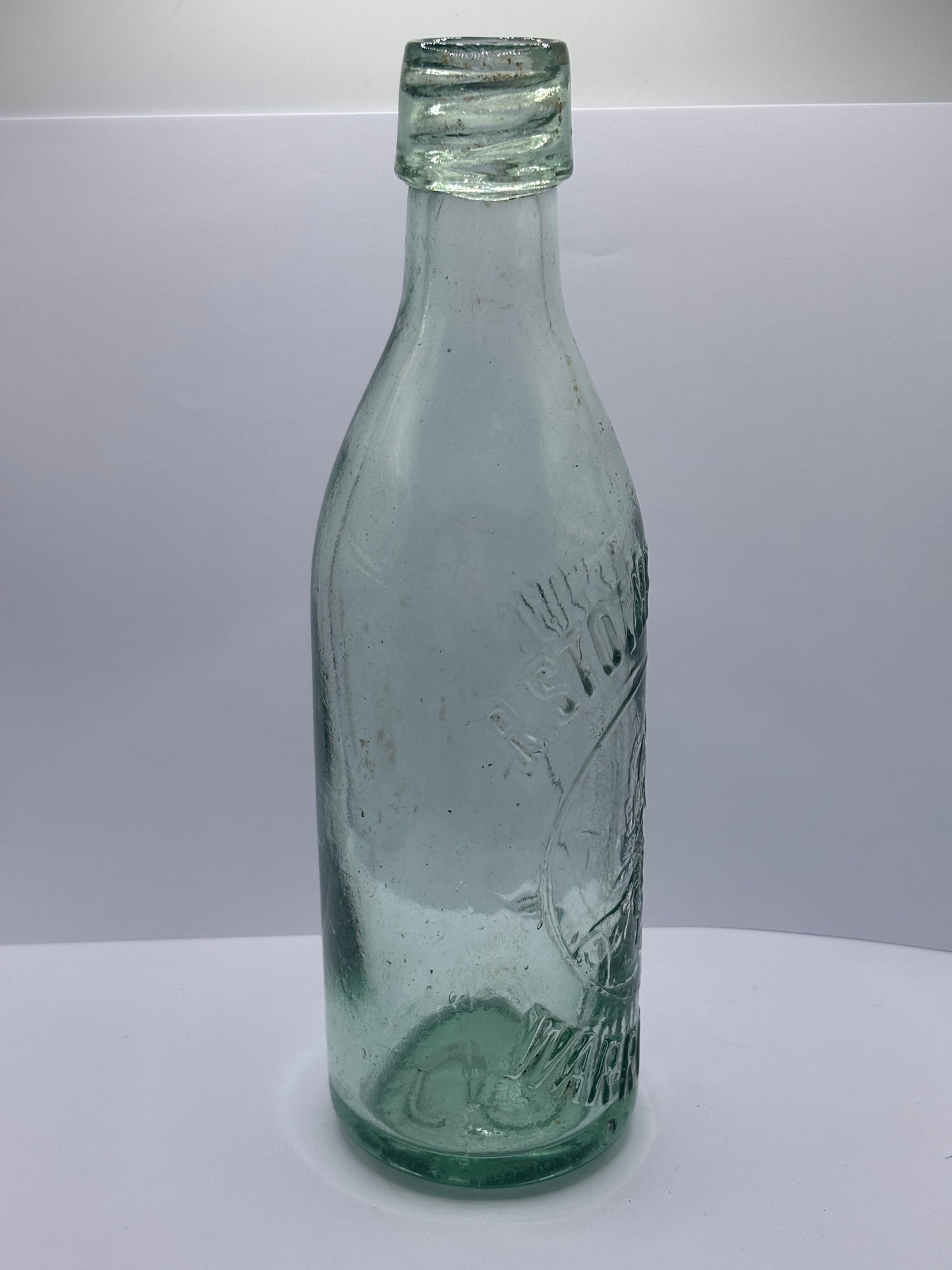 Old aqua glass Stotherts beer bottle