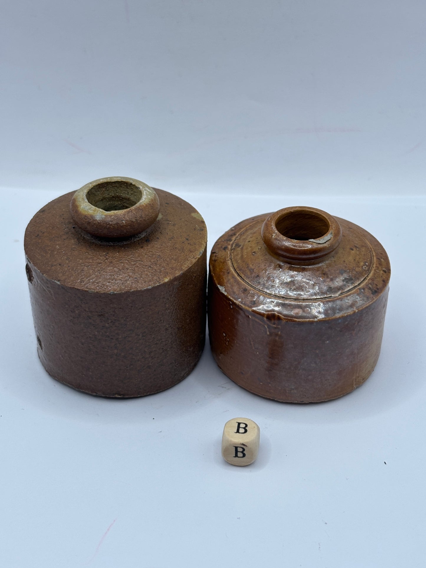 2 brown stoneware inkwells, ink bottles (B) pork pie inks