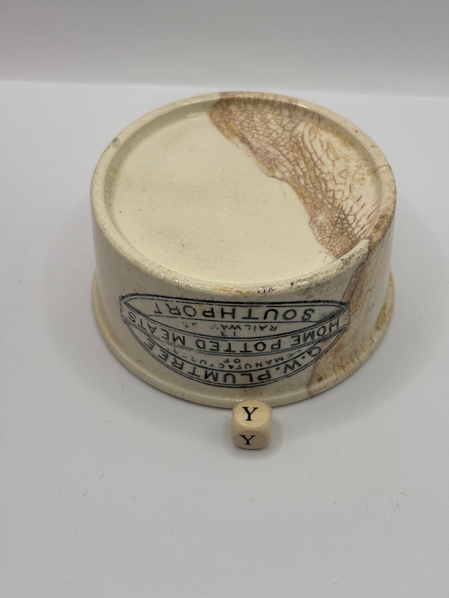 Old Plumtree advertising meat paste pot. Stained & crazed (Y)