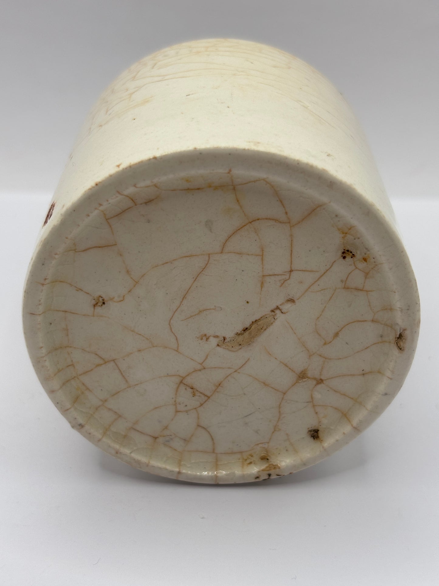 Old white stoneware jar, stained & crazed