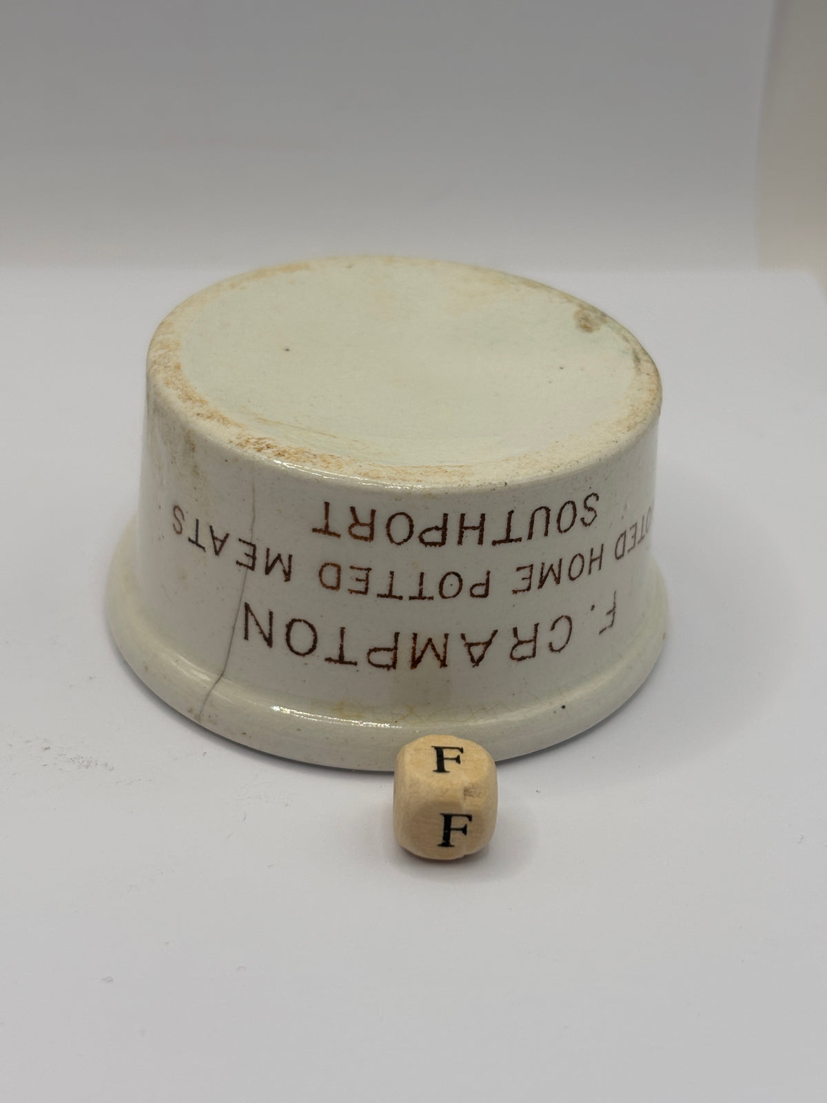 Old small advertising meat paste pot, Cramptons noted home potted meats