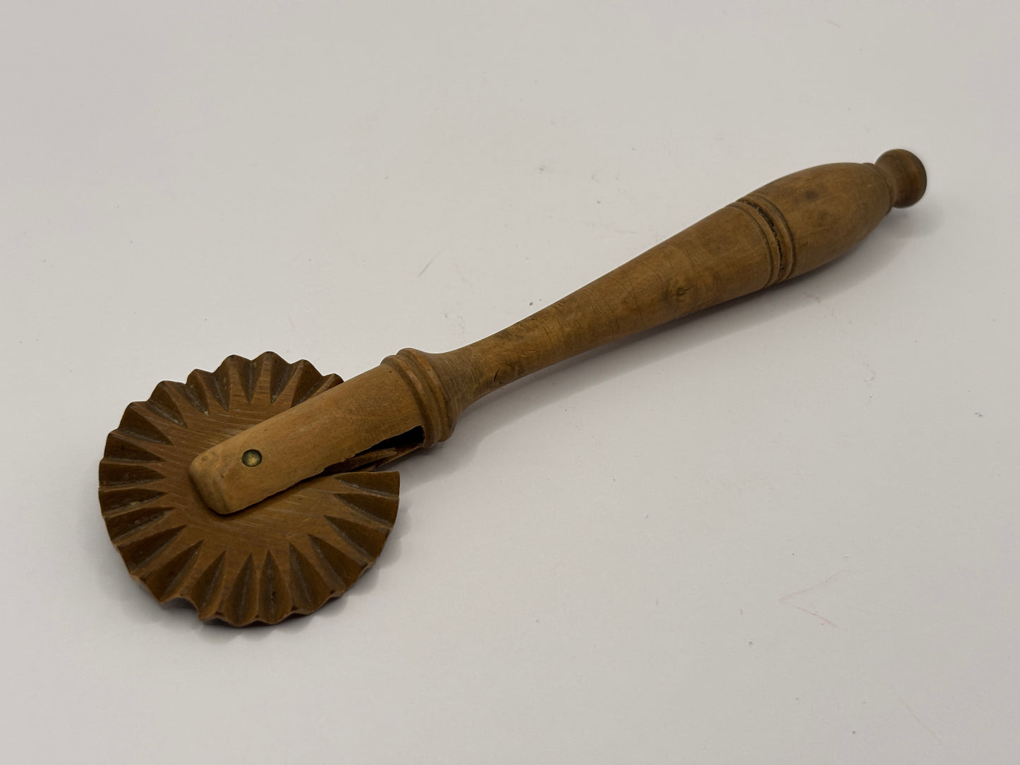 Vintage wooden pastry cutter, household