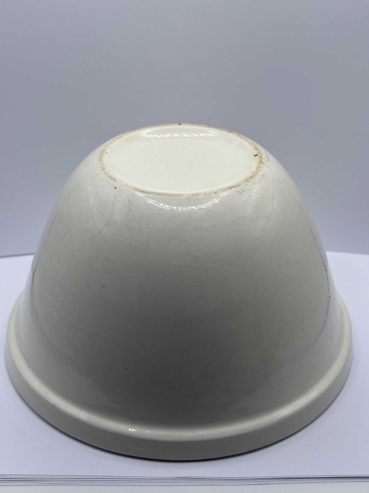 Old stained stoneware pudding bowl