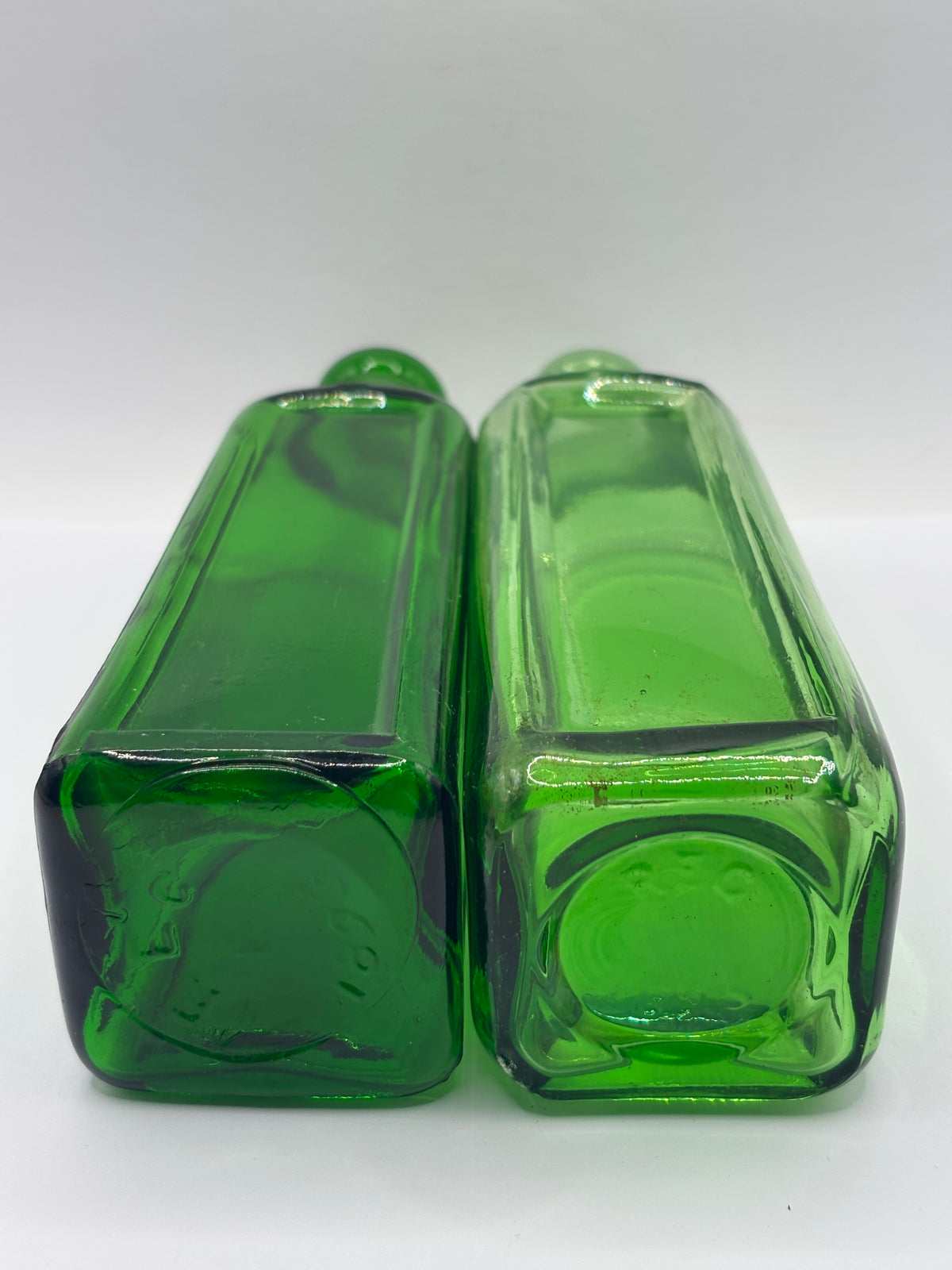 2 old green glass IZAL bottles 18.5cms