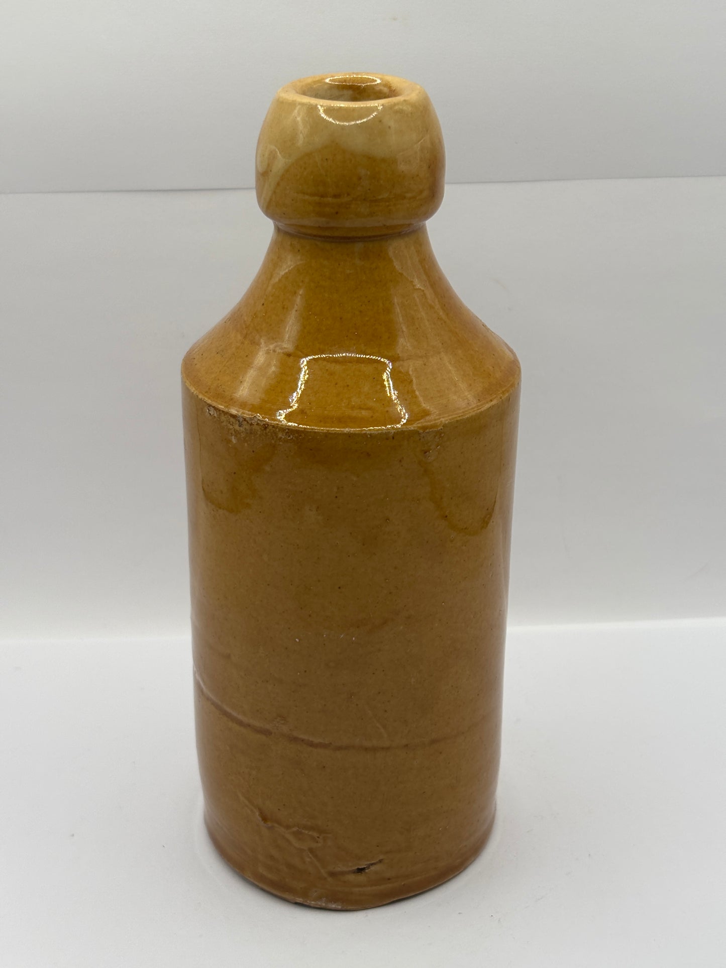 Old stoneware ginger beer bottle, Buckleys brewery, Pure ginger beer. Llanelly brewery