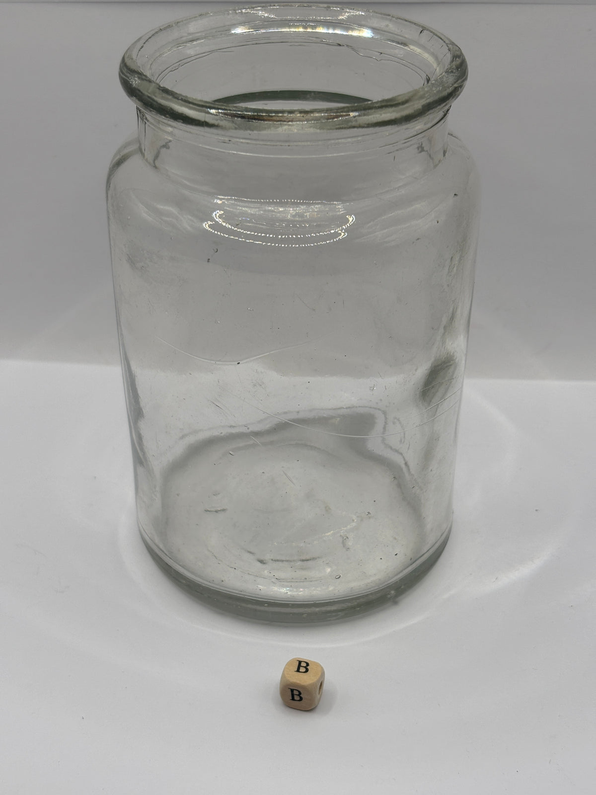 Old clear glass pickle jar (B)
