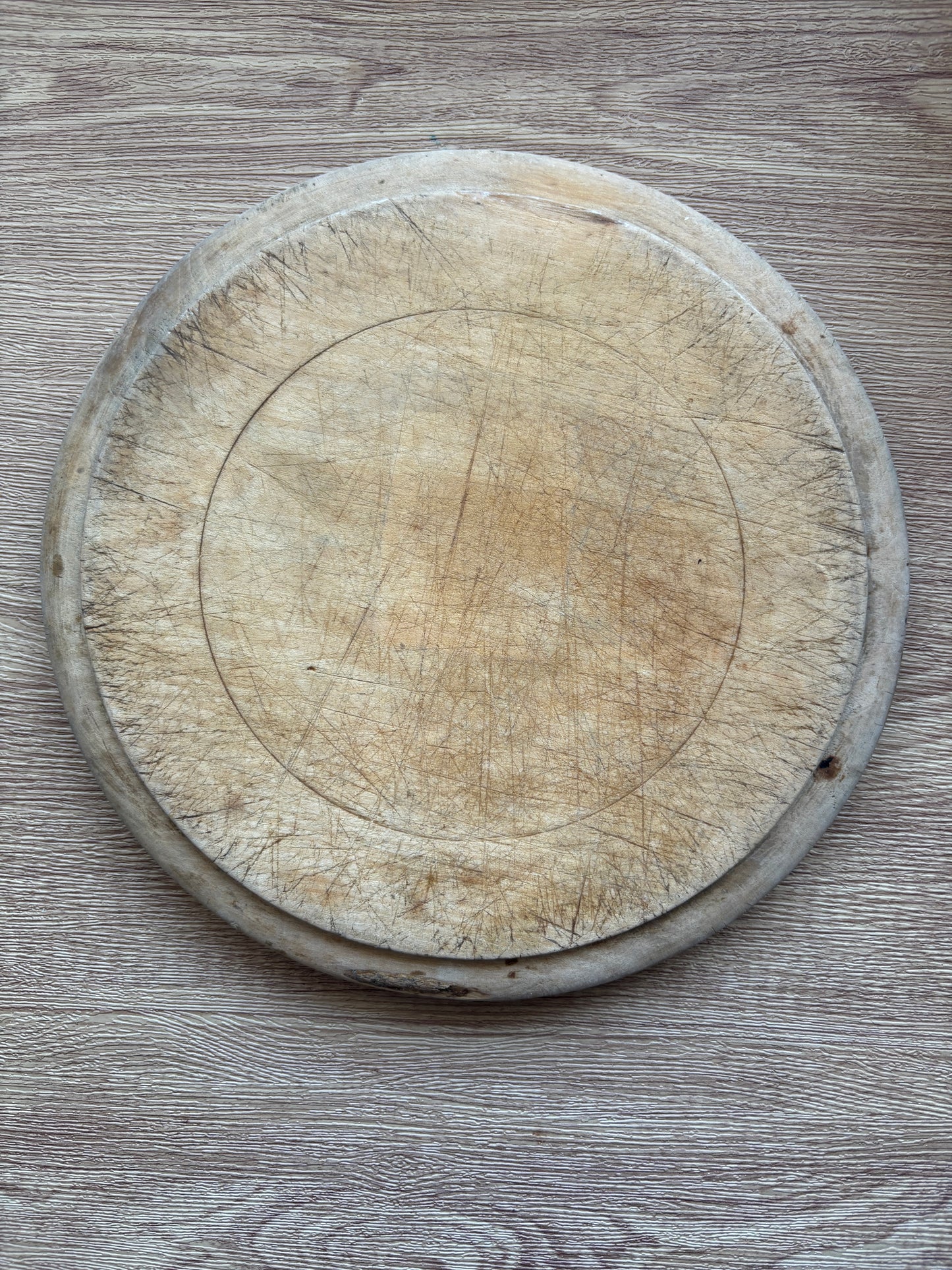 Old wooden carved bread board