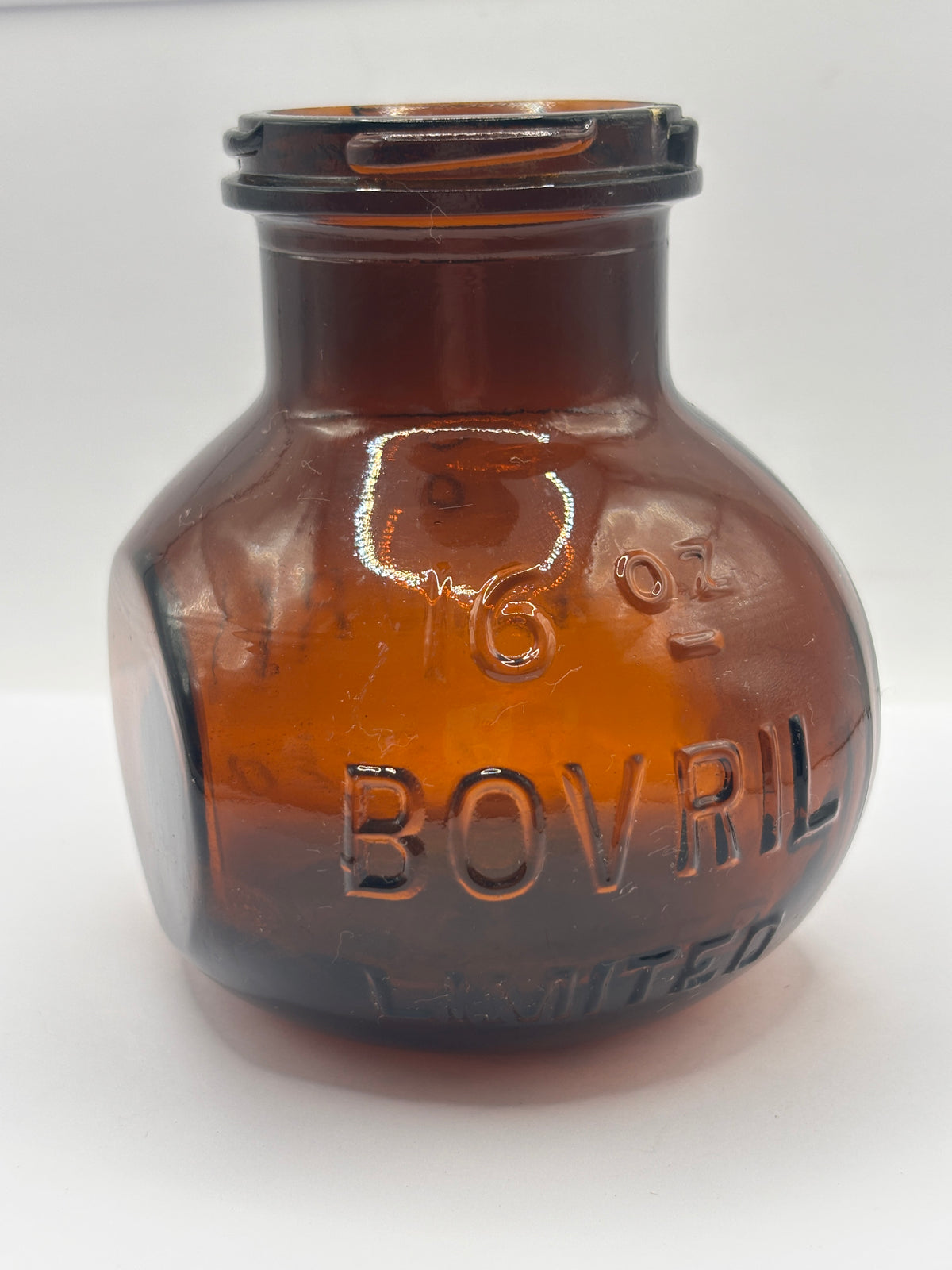 Old 16oz amber glass advertising Bovril bottle