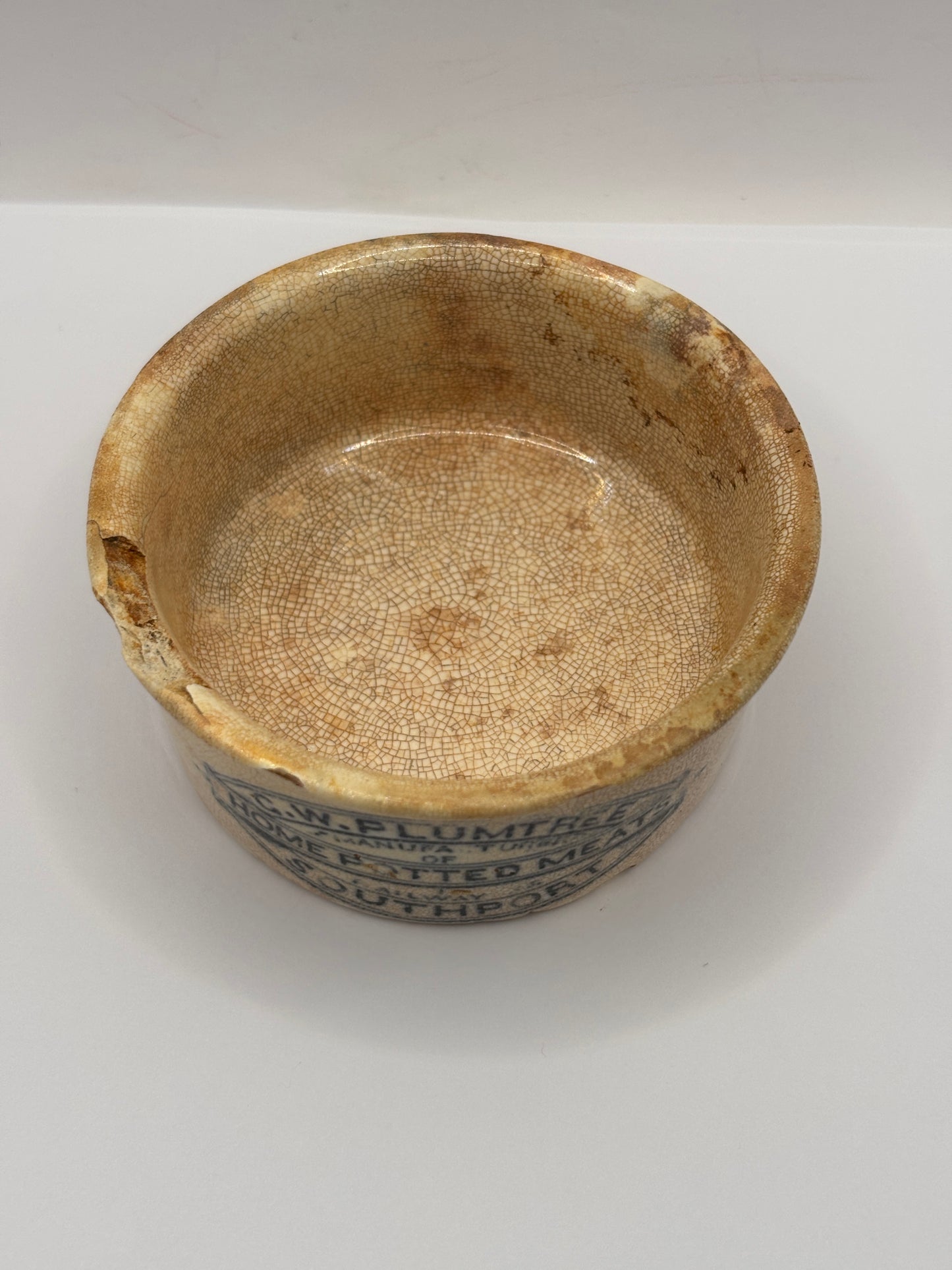 Old Plumtree advertising meat paste pot. Damaged