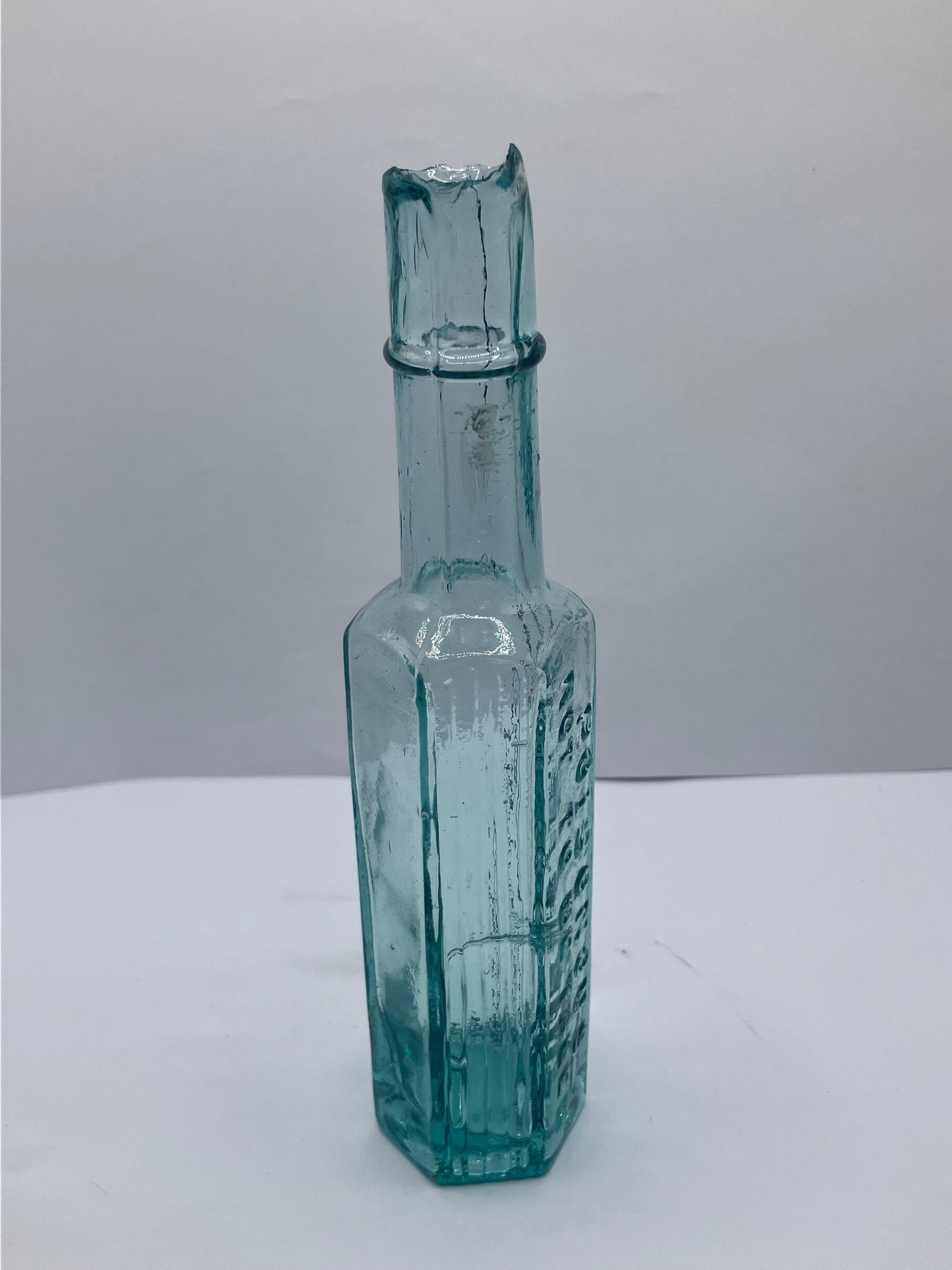 Tall slim poison bottle, poisonous not to be taken