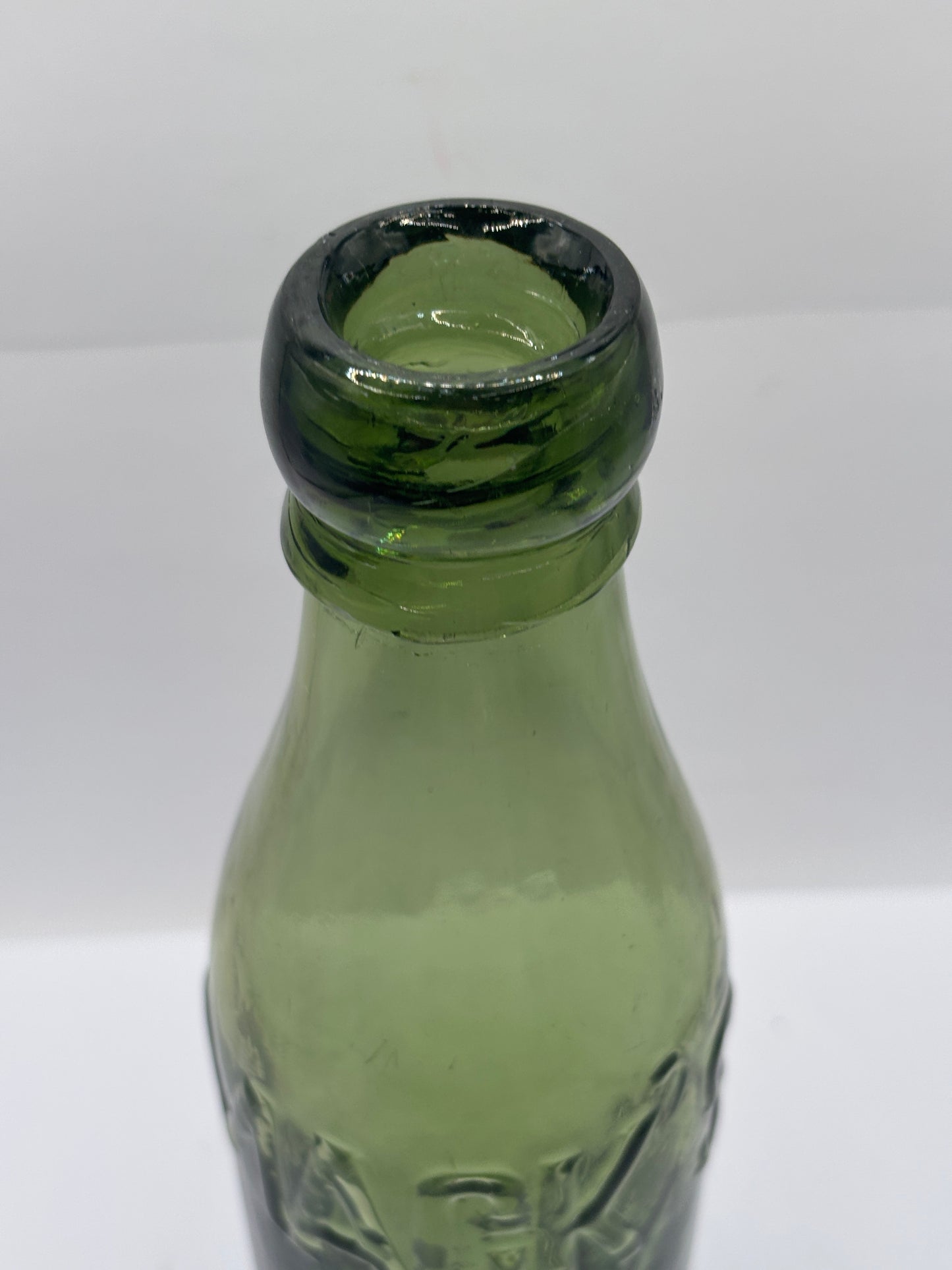 Old advertising green glass beer bottle, Macks Manchester