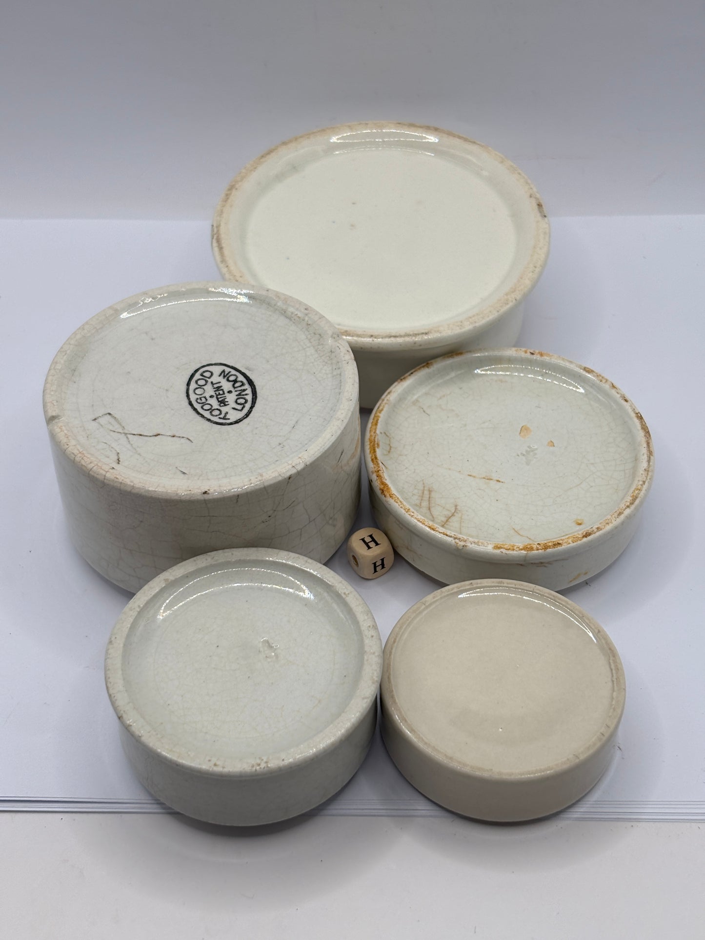 5 old stoneware bases, stackers (H) damages