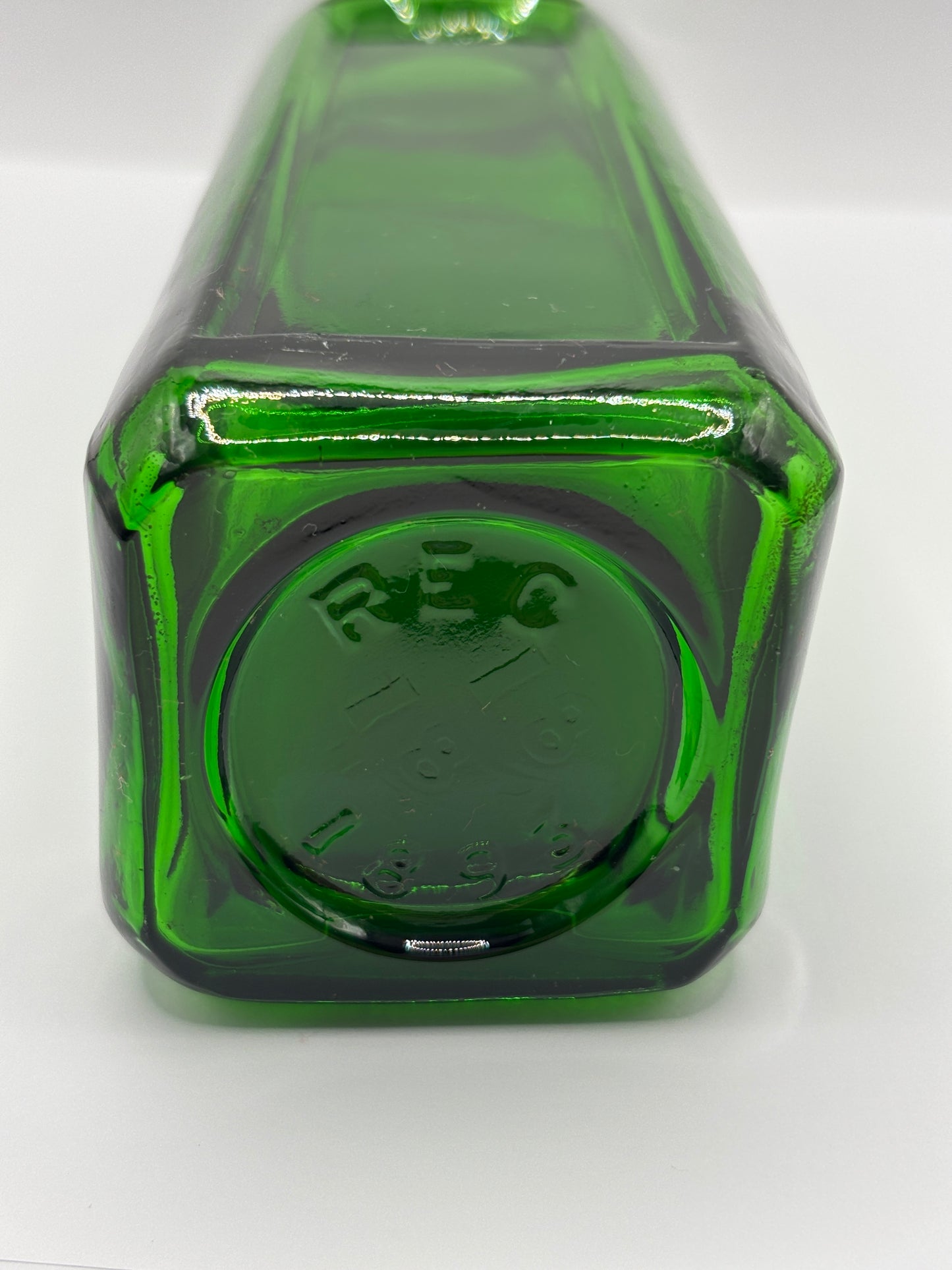 Old green glass Izal bottle