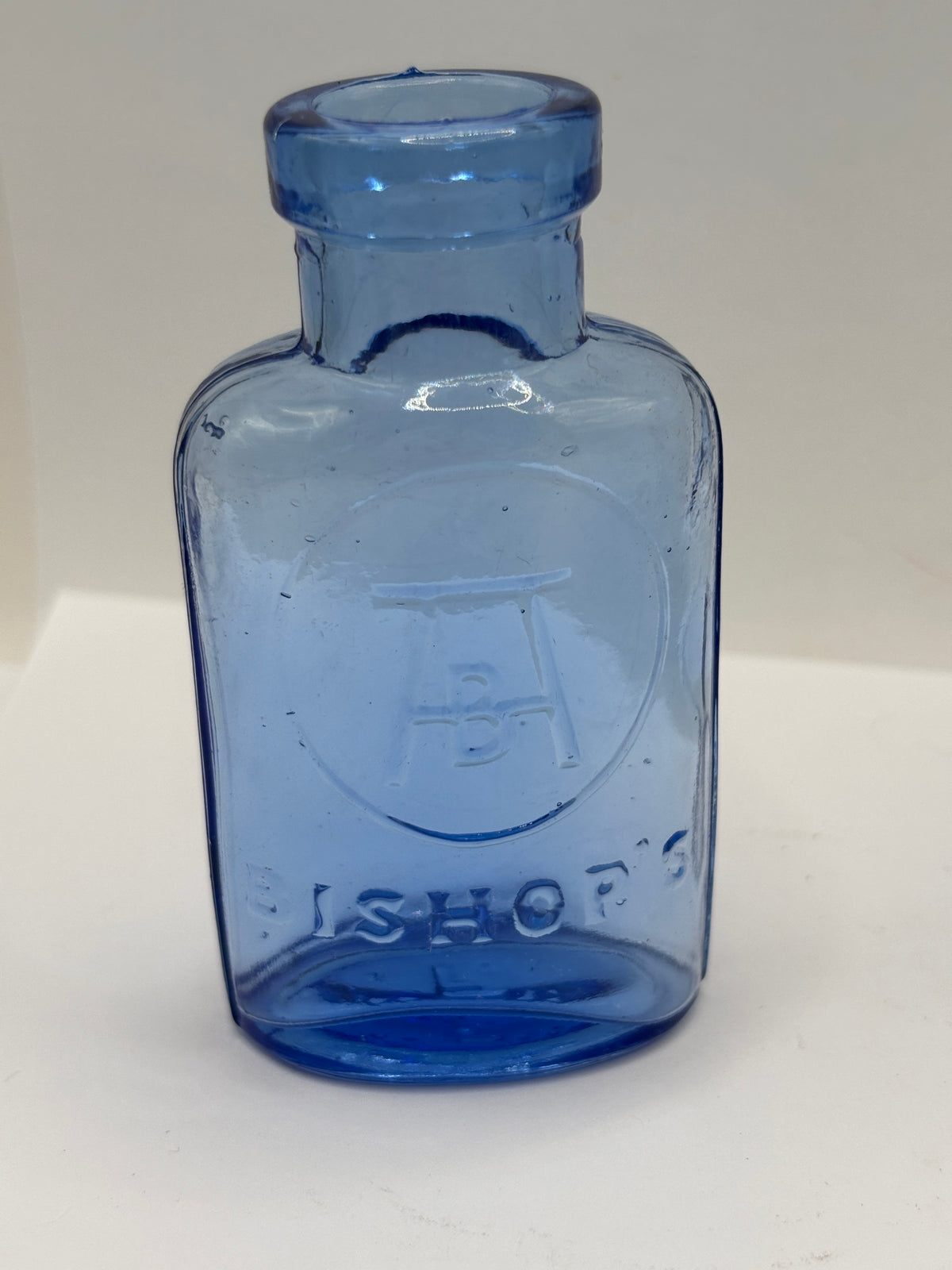 old small blue bishops chemist bottle
