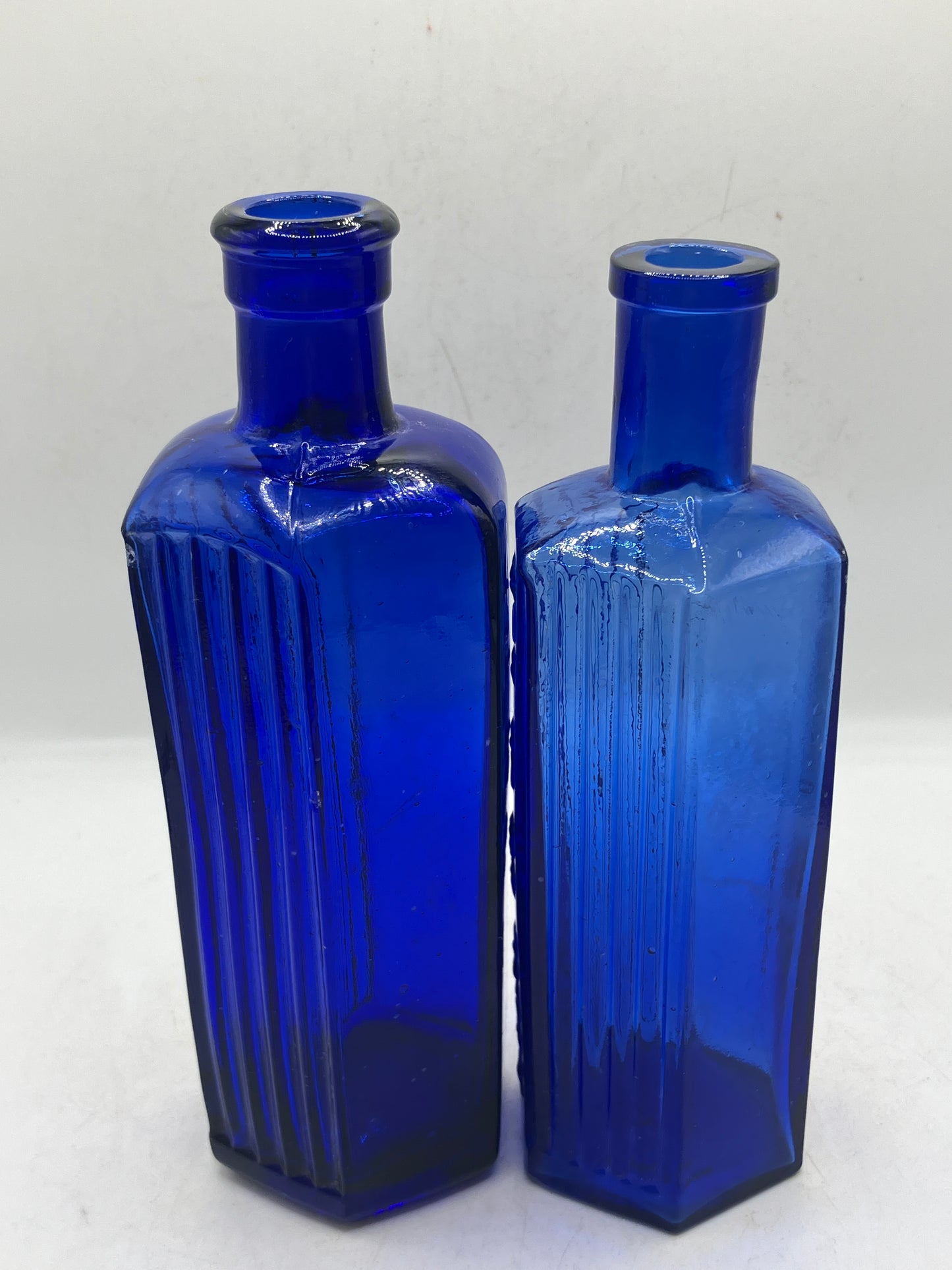 2 blue glass ribbed poison bottles, Not to be taken