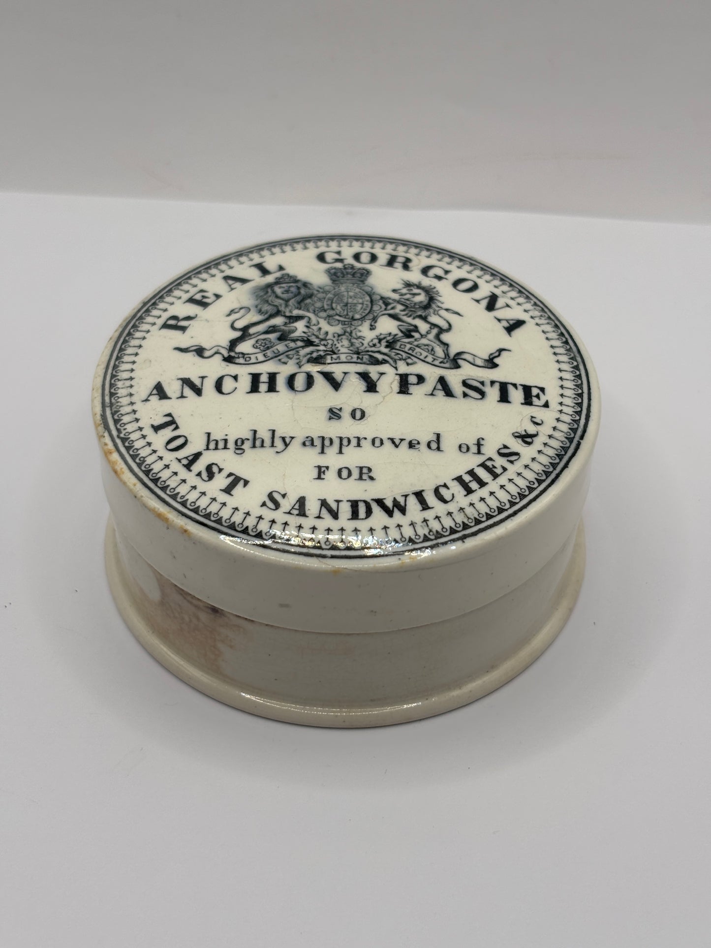 Old advertising lid and base. Real Gorgona anchovy paste. Chipped