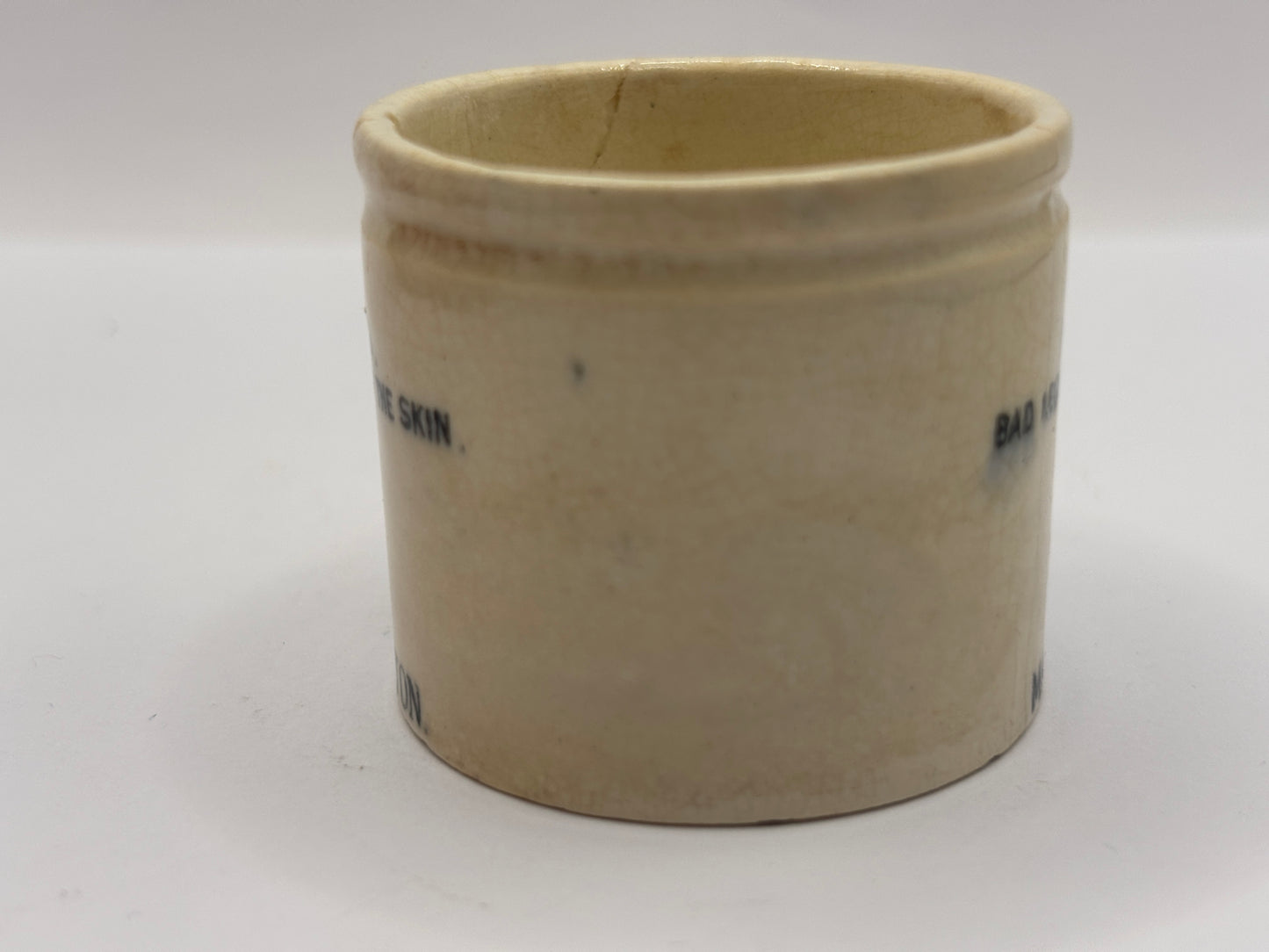 Old advertising ointment pot, The Egyptian salve. Damaged